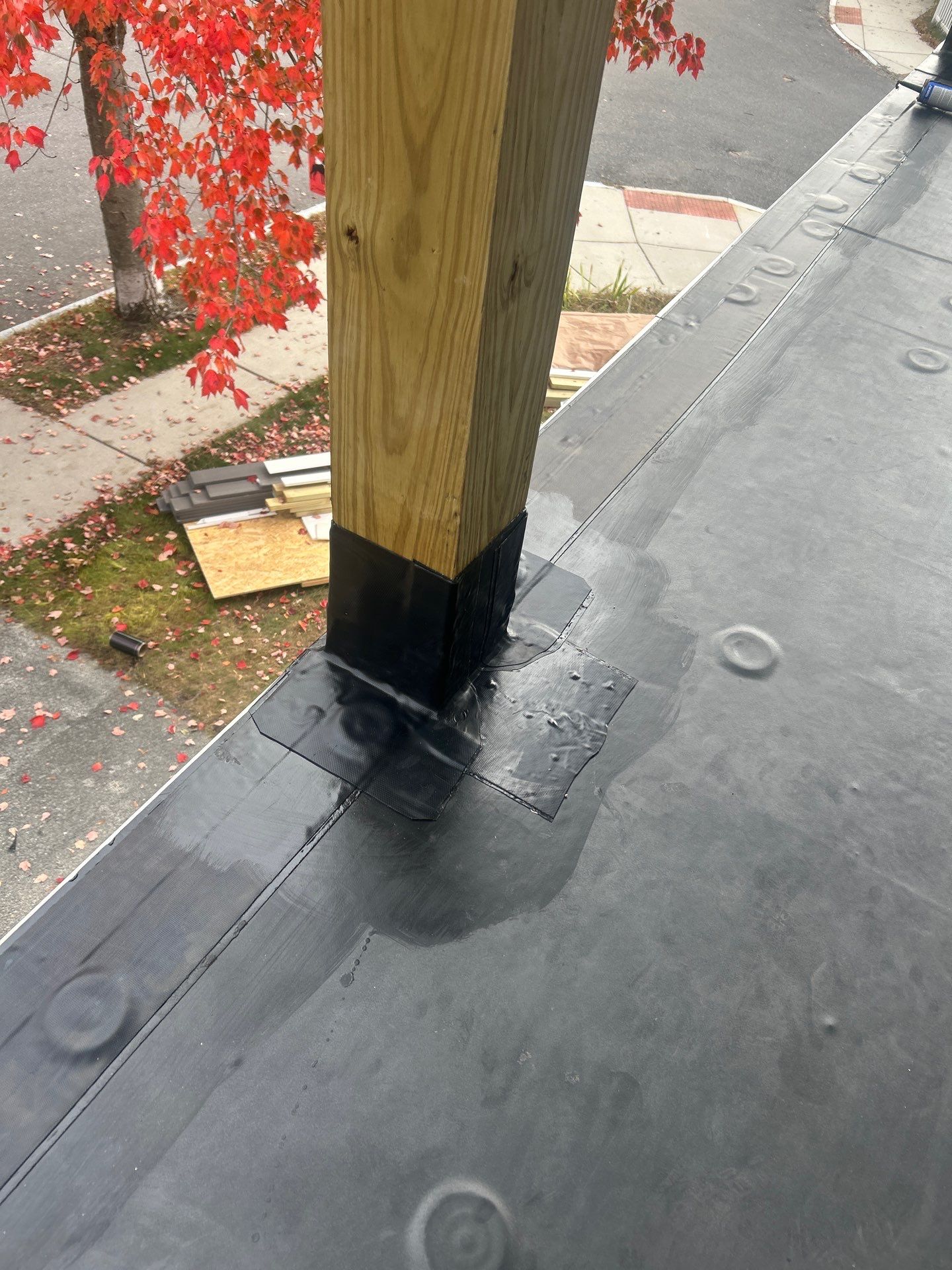 Watertown Porch EPDM Rubber Roof Installation by Mighty Dog Roofing of Greater Middlesex County
