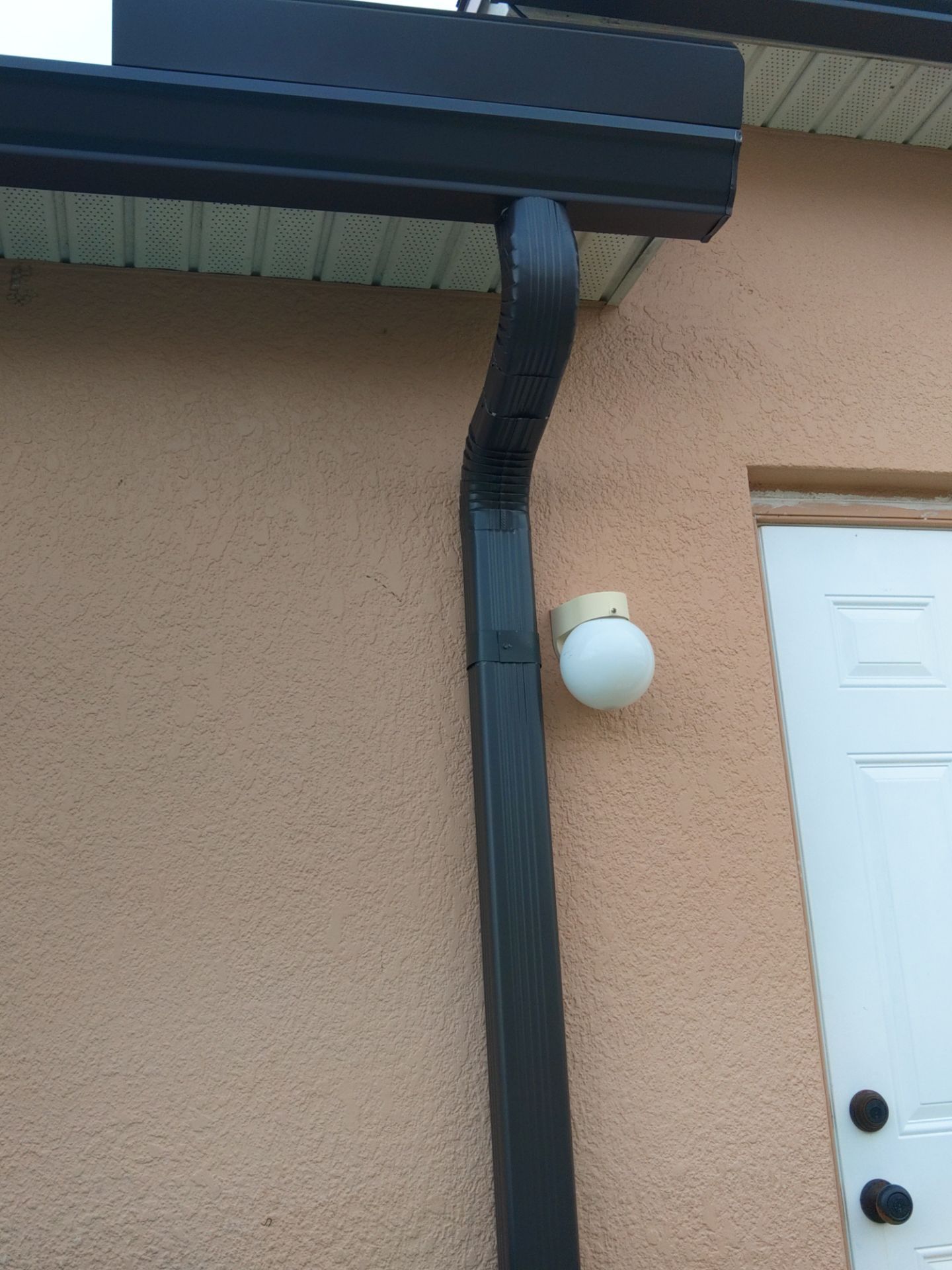 Downspout Installation for Multi-Story Homes in Cape Coral FL by Gutter Professors