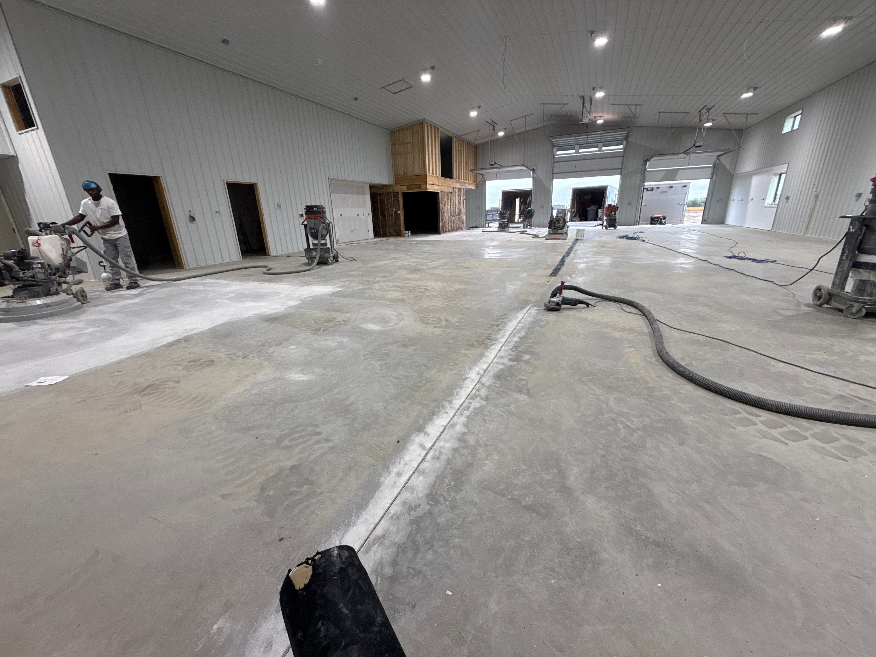 Custom Speckled Floor Coating for Large Montrose Shop by Select Painting, Coatings & Garage Cabinets
