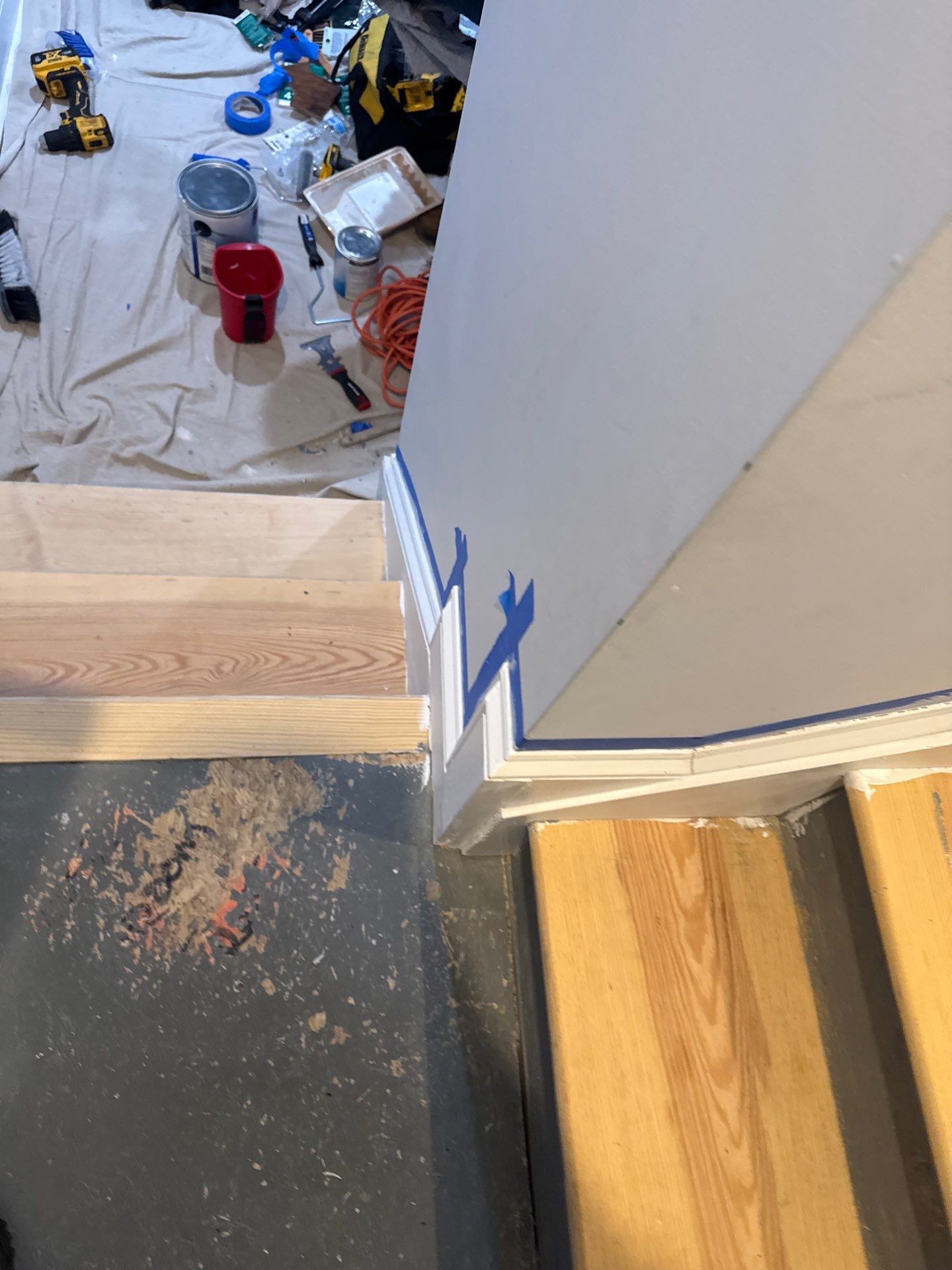 Stairway Installation using t vinyl stair tread and reversibleriser by La Bendicion Contruction Llc