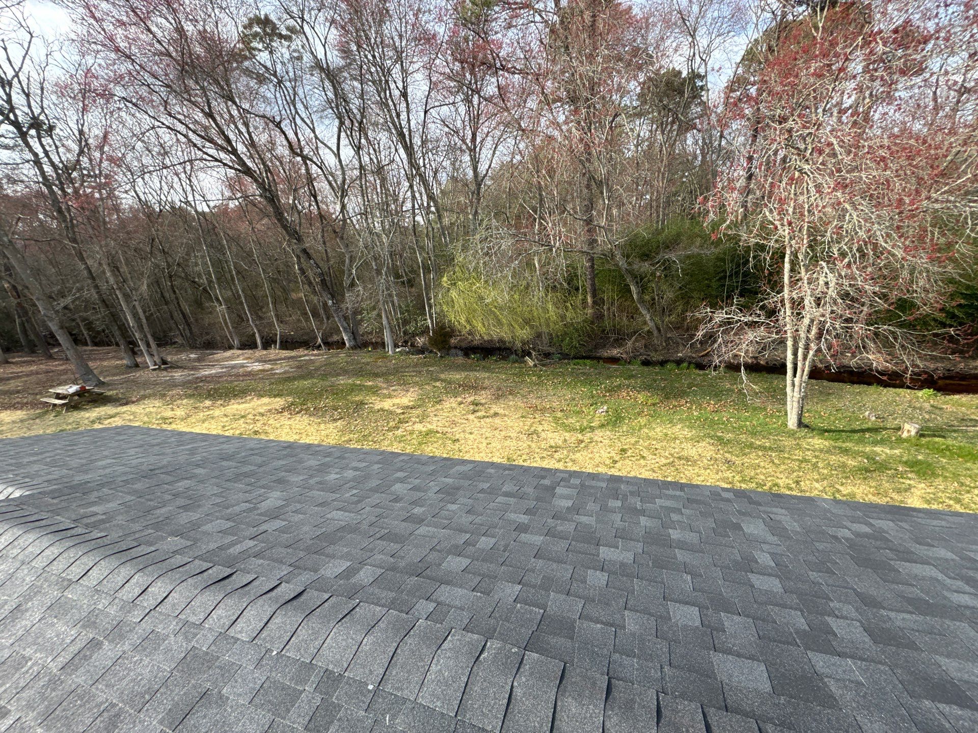 Onyx Black Shingles by Reimagine Roofing