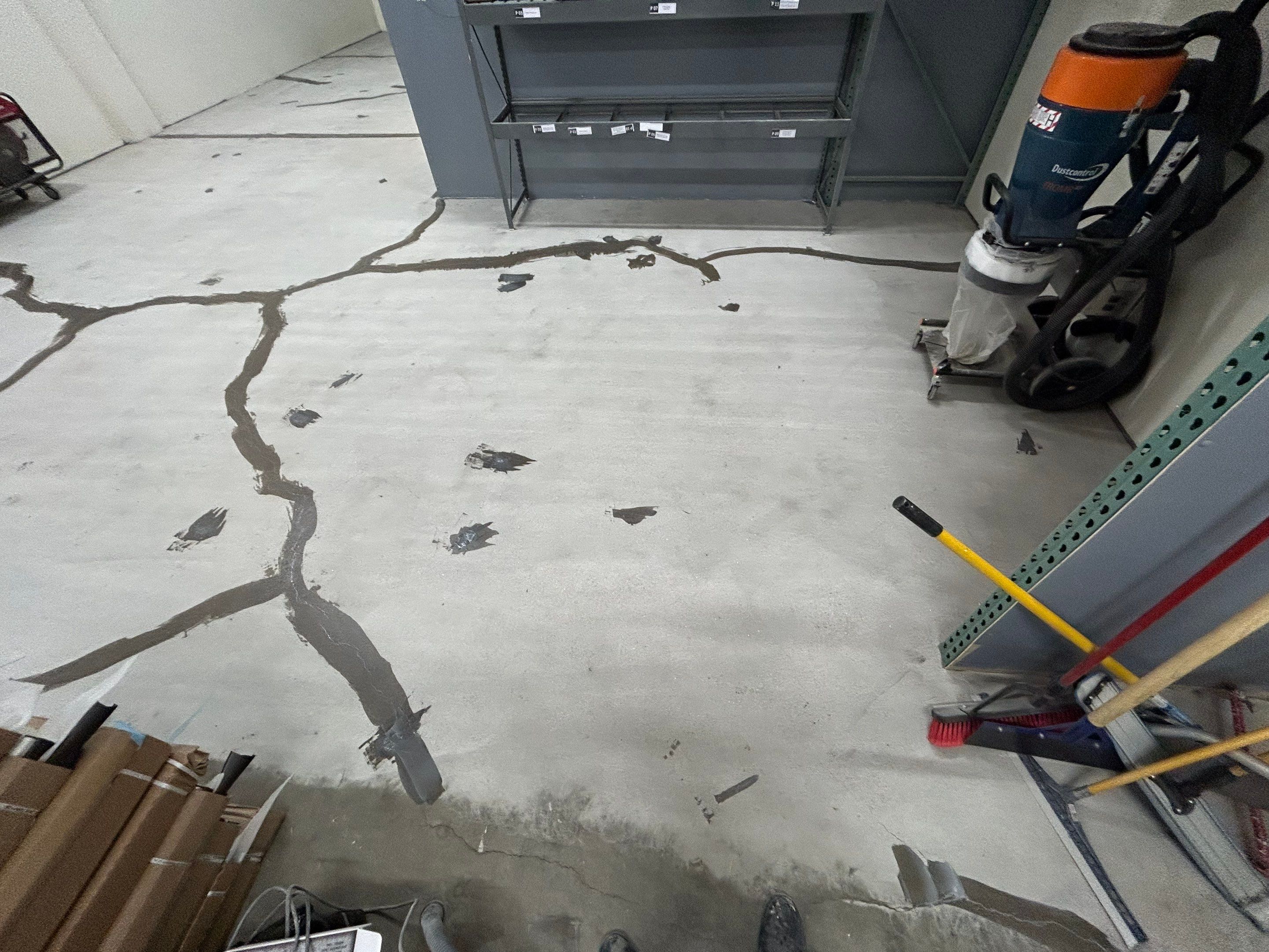 Garage Floor Coating Transformation by DiGiorgi Roofing and Siding Inc
