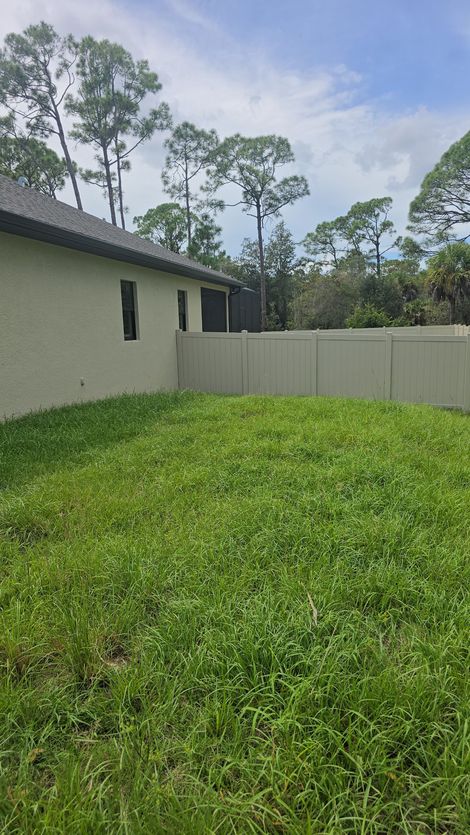 Tan Vinyl Privacy Fence and Gate Installation in Port Charlotte by True Fence LLC