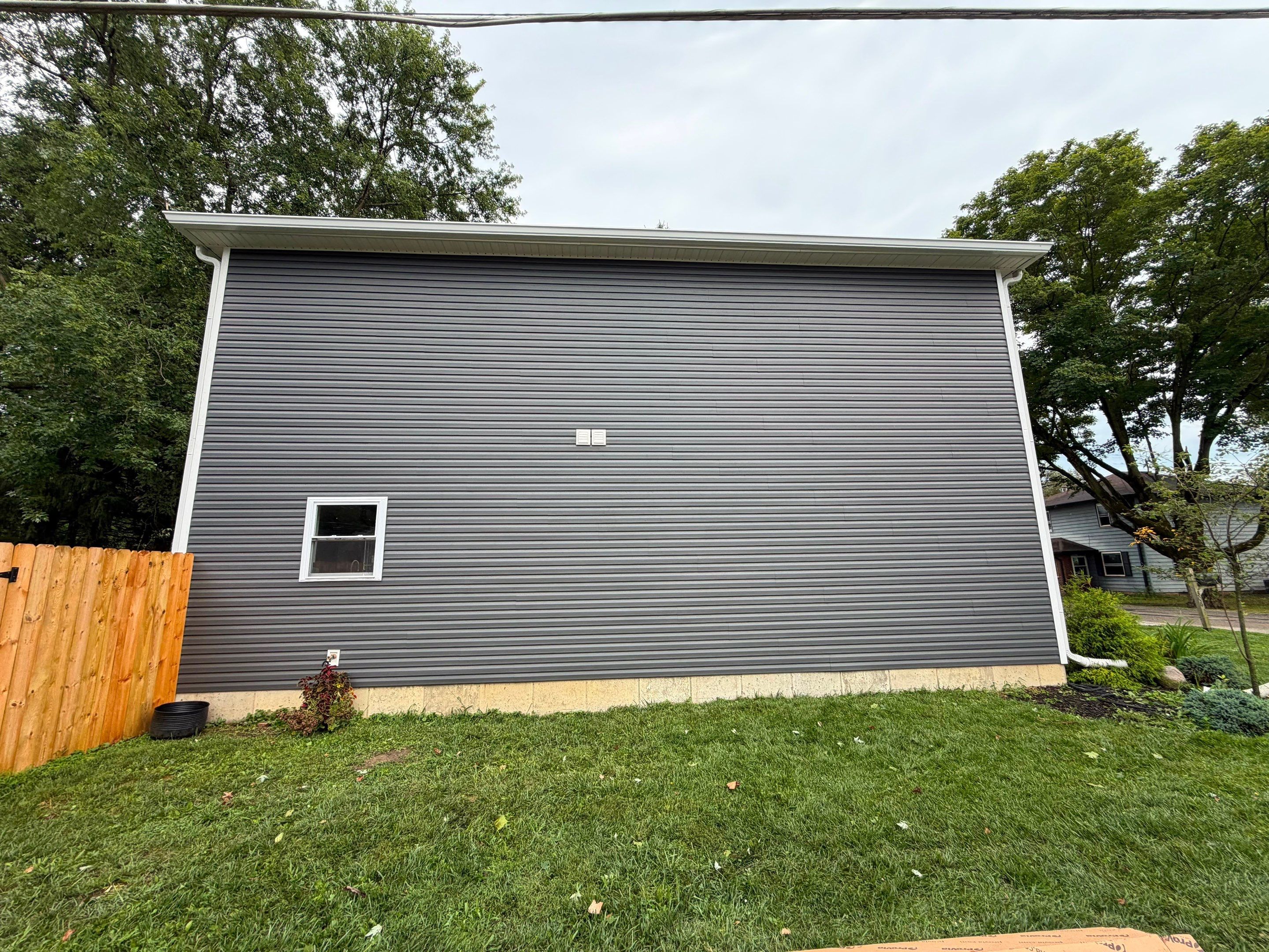 Provia Heartec Siding - Nightfall by Hoel Roofing & Remodeling