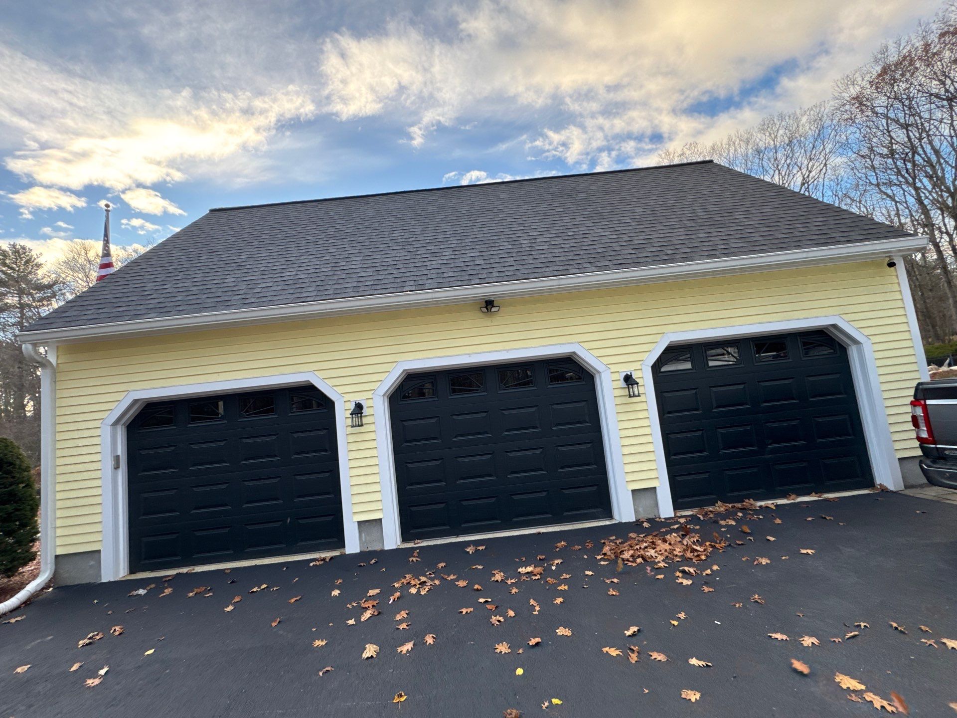 Chelmsford Premium Roof: Onyx Black Shingles with Standing Seam Metal Porch by Mighty Dog Roofing of Greater Middlesex County