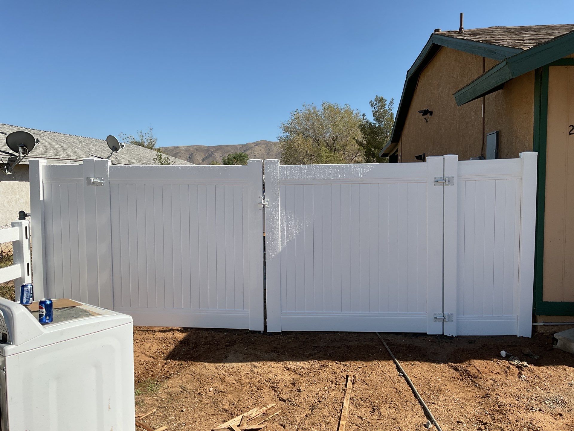 Fence Installation using Ranch Style Vinyl by Fence Guys Inc.