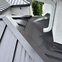 24ga 1.5" Mechanical Seam Dark Bronze by Total Roofing System The Metal Roof Experts