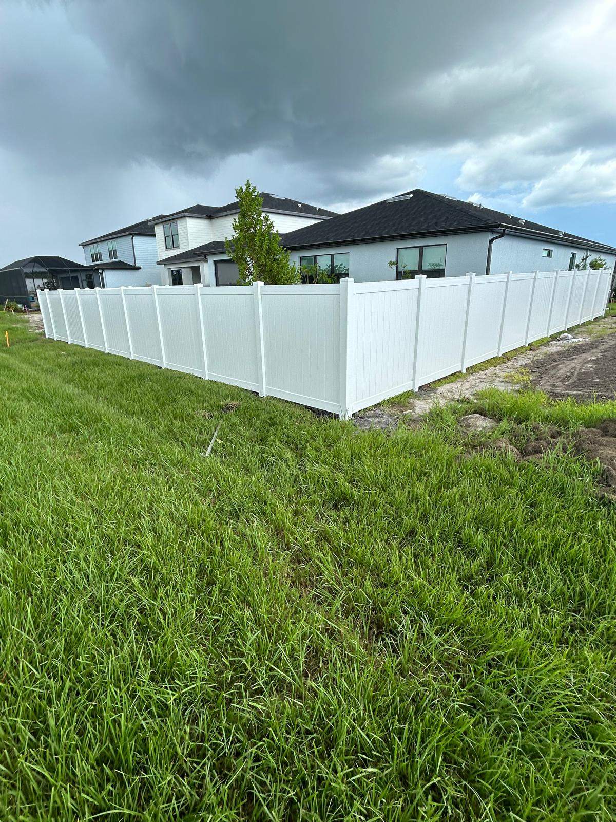 White Vinyl Privacy Fence Installation for North Port Residential Property by True Fence LLC