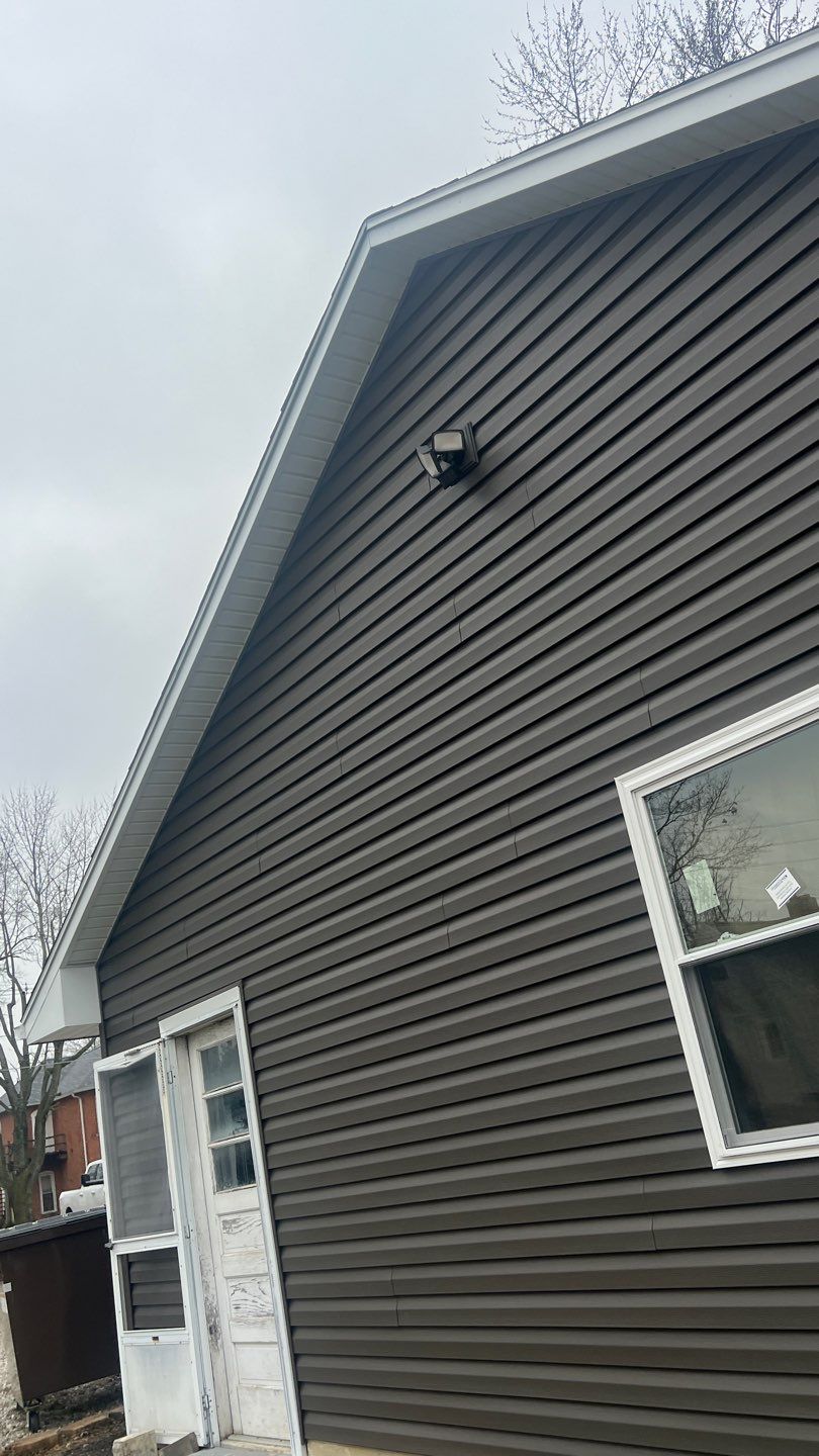 Residential fascia replacement using Exterior Portfolio 4.5 DL - Peppercorn by Nitro Roofing and Construction