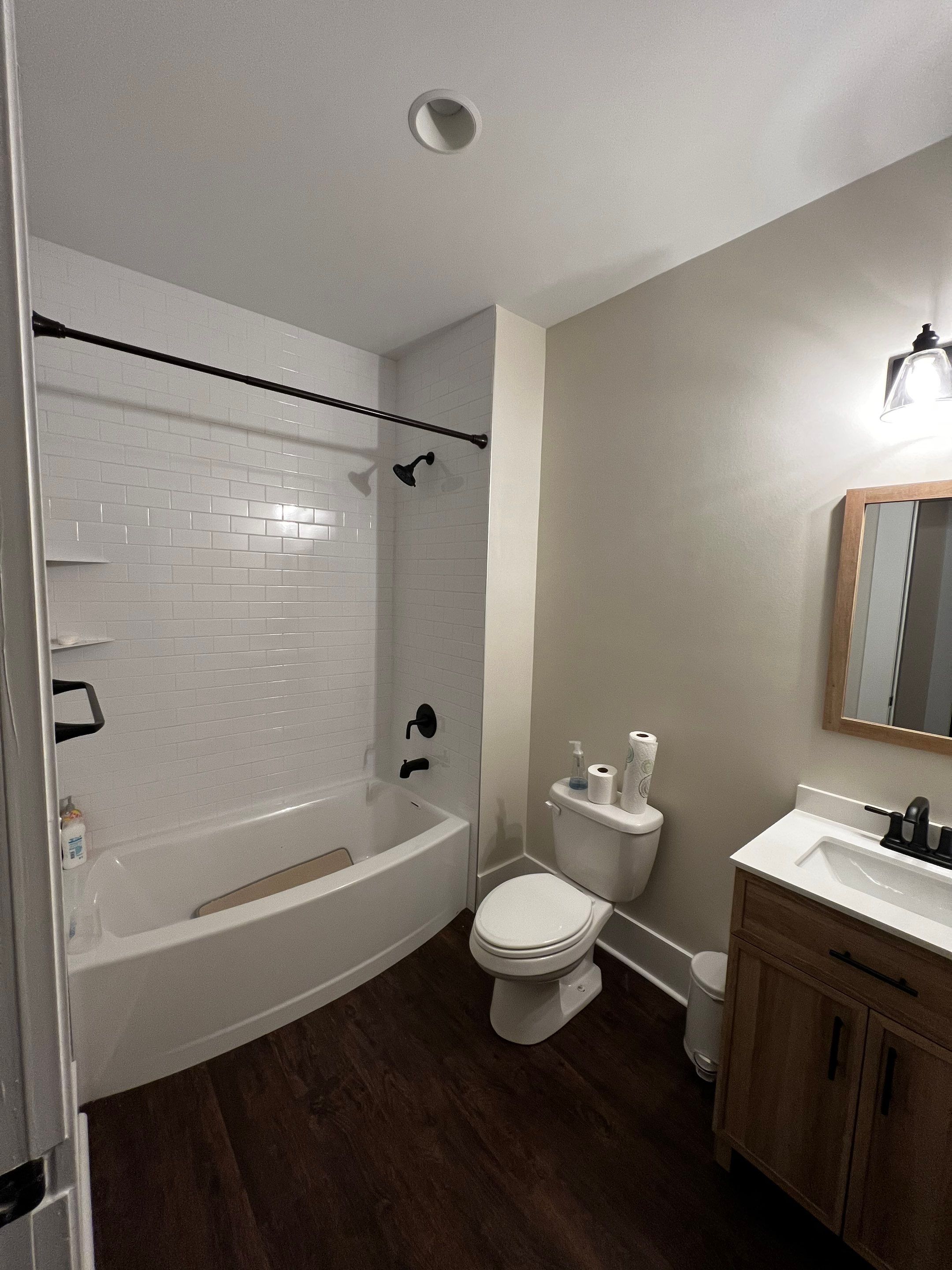Basement Remodeling With New Bathroom and Luxury Vinyl Flooring by Swift Home Renovations