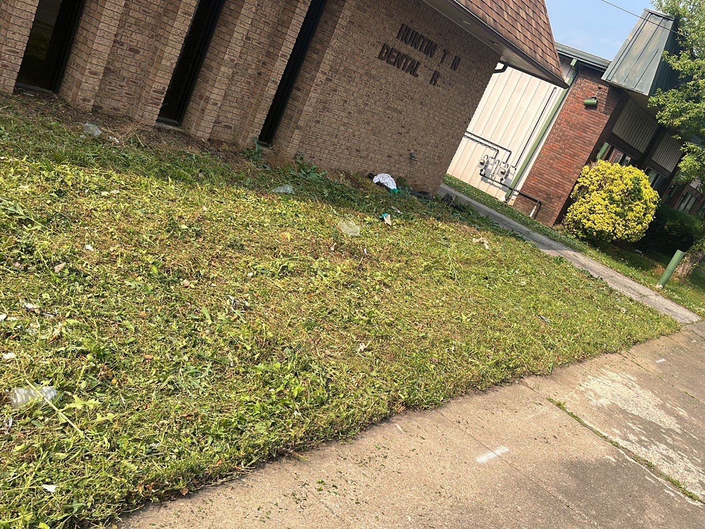 Lawn Mowing using Lawn mower by GrassBusters, Inc.