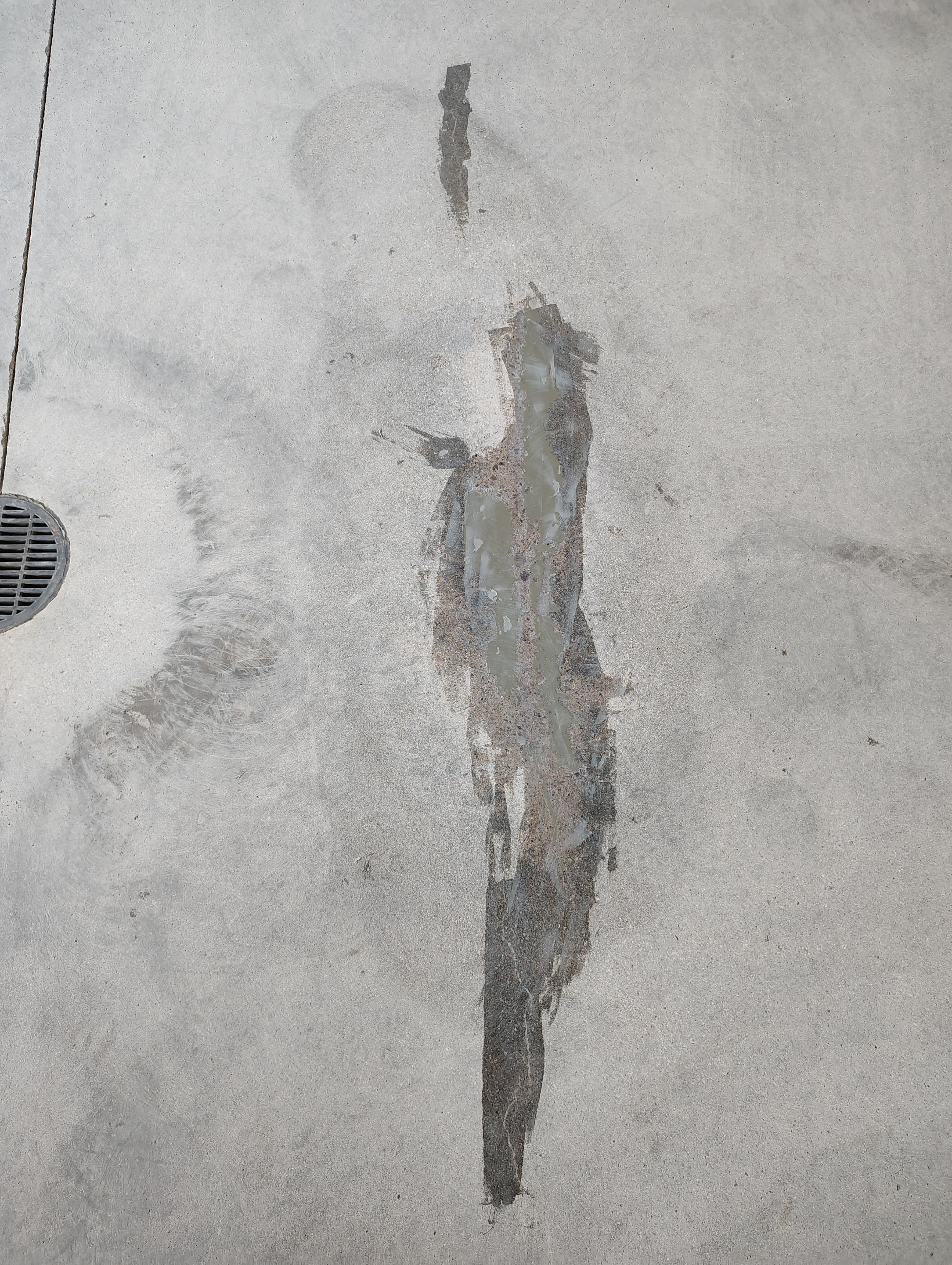 Multi-Car Garage Concrete Coating and Crack Repair in Dell Rapids by Select Painting, Coatings & Garage Cabinets