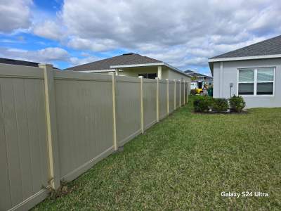 Tan Vinyl Privacy Fence Repair in Port Charlotte