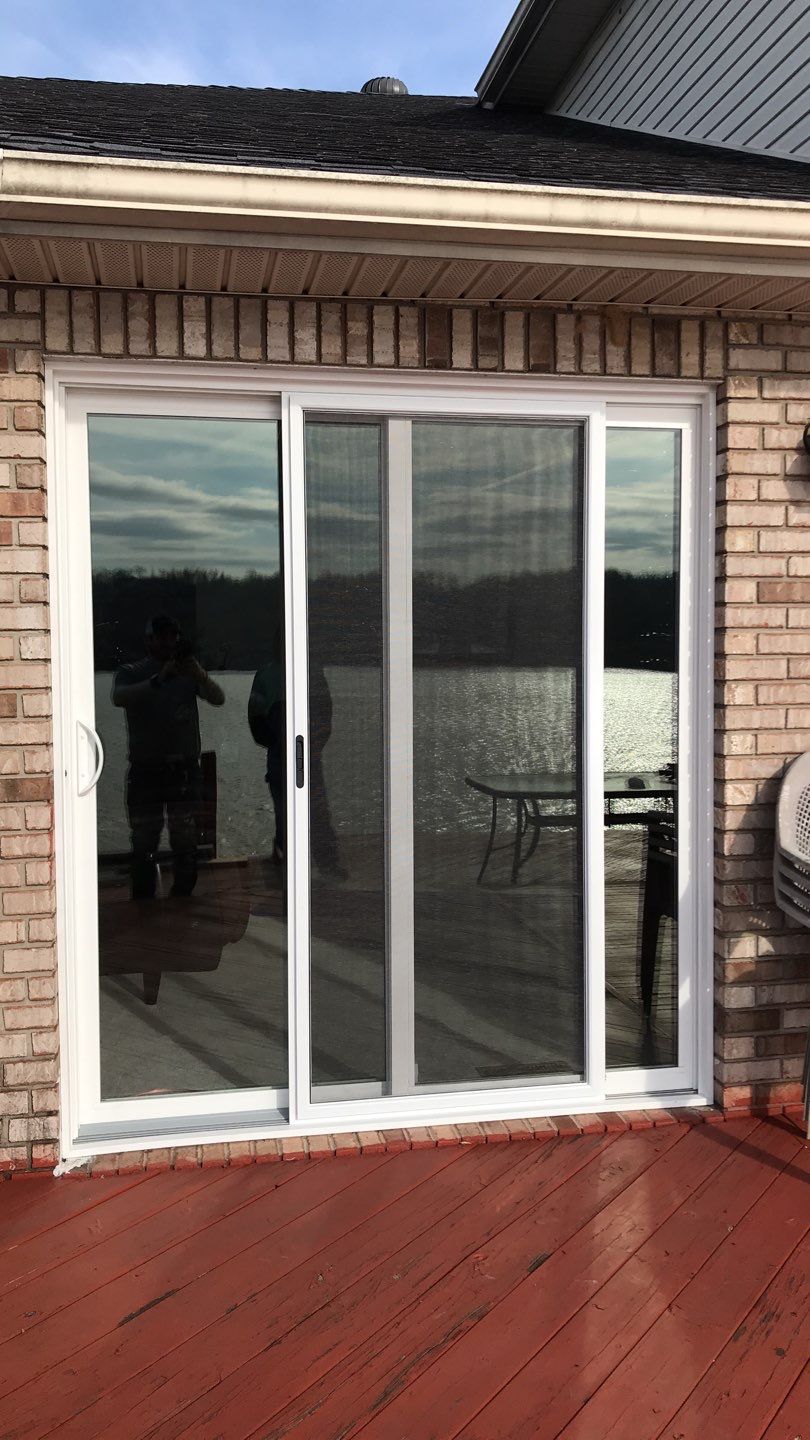 Deck Refurbush and Door Replacement using Trex Decking and Railing. Polaris Patio Doors by Secure Construction Company Inc