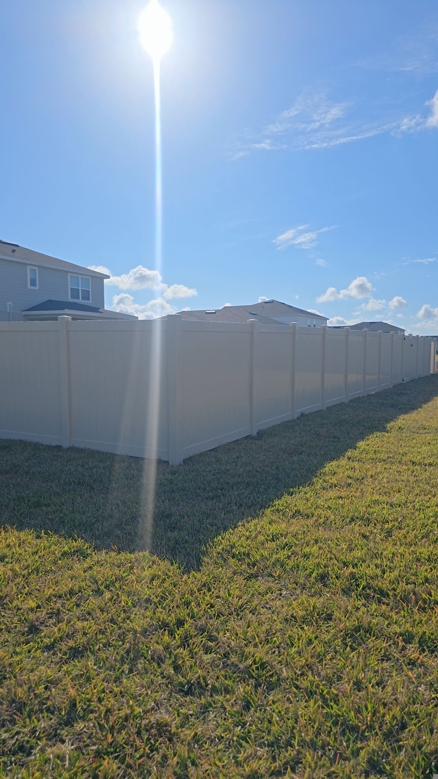 Tan Vinyl Fence in West Port by True Fence LLC