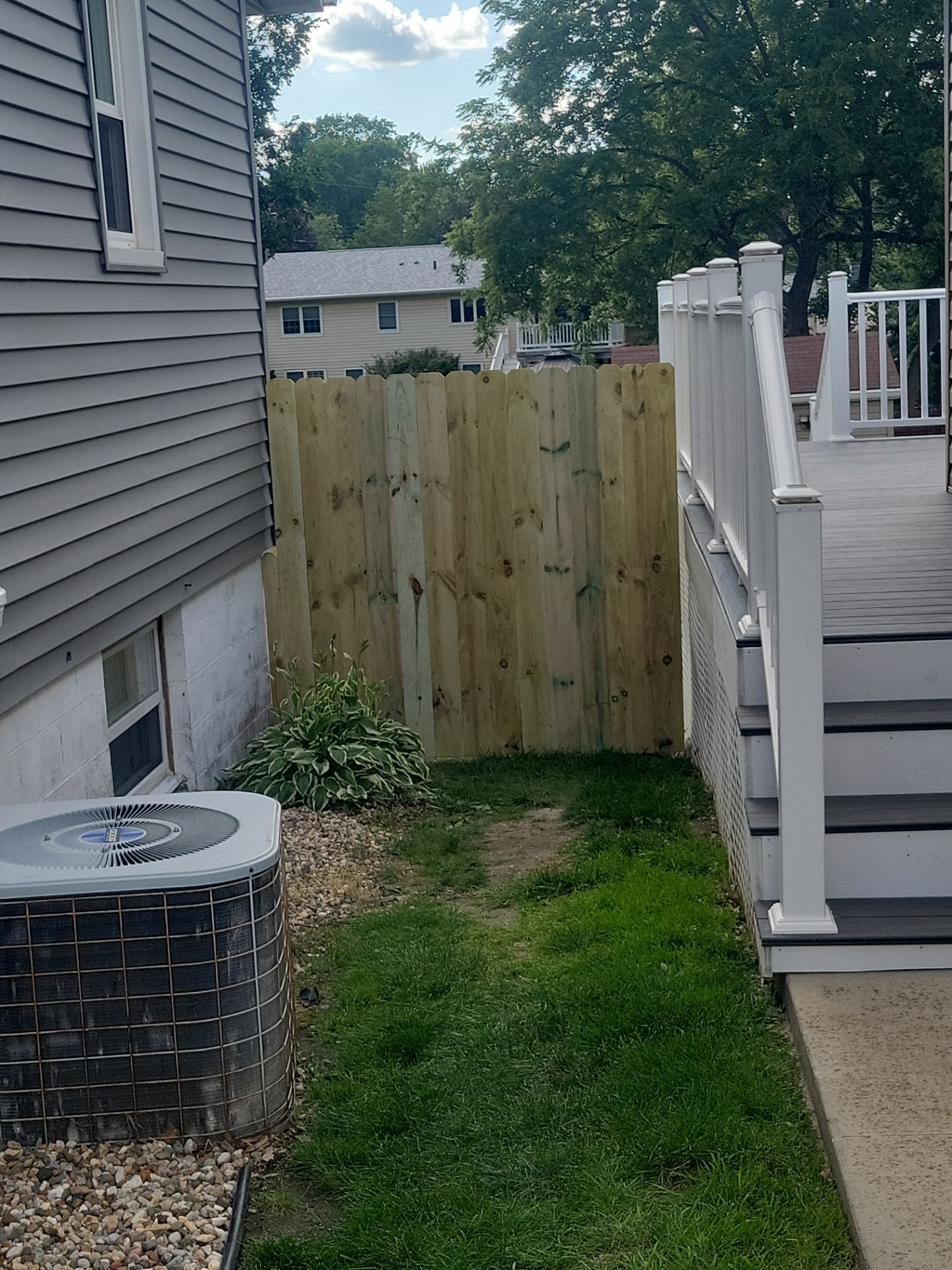 Pressure-Treated Pine Privacy Fence and Custom Gates in Waterloo by Perfect Picket Fence and Stain