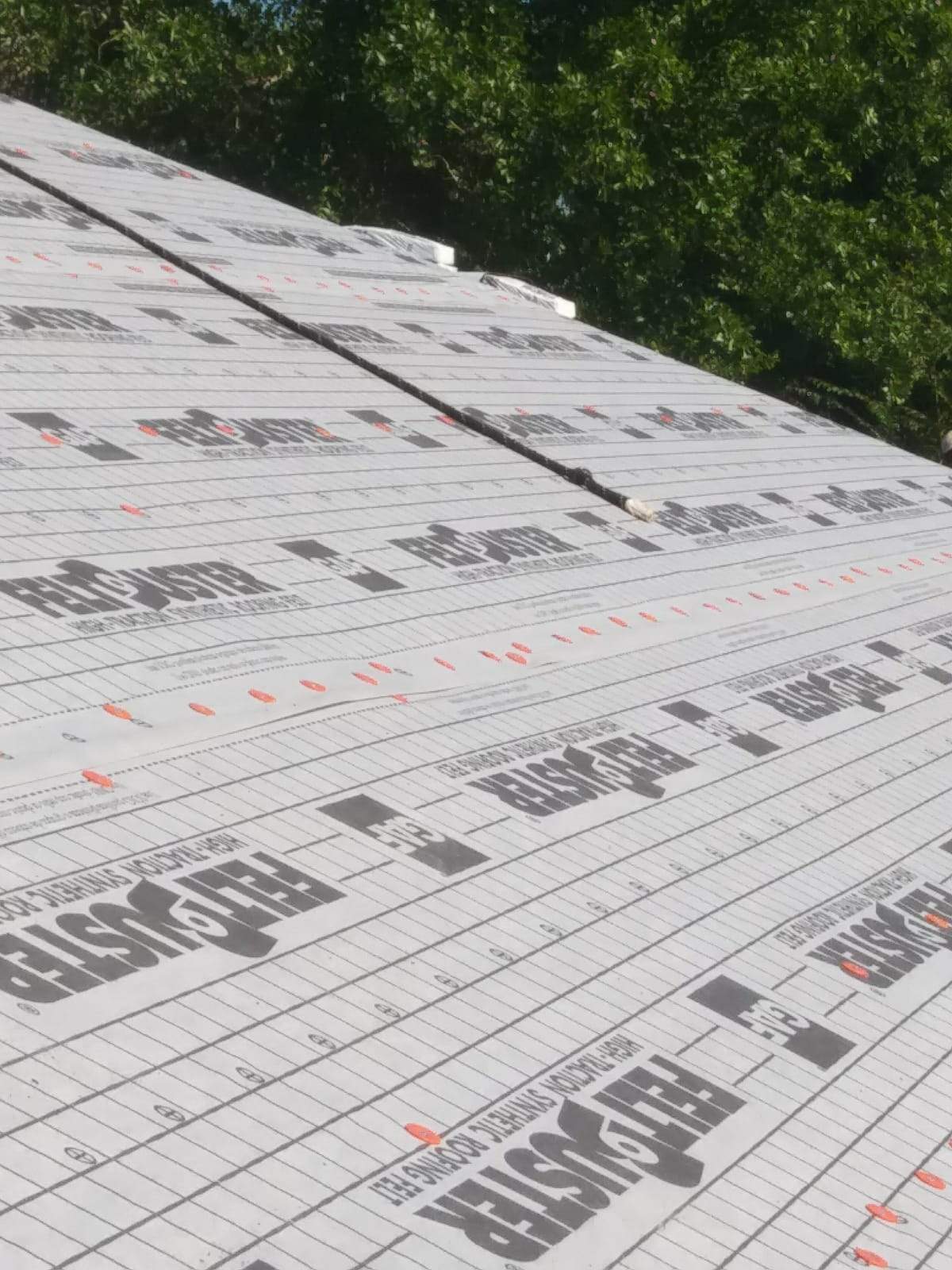 Residential Roofing Installation using Roof Replacement by American Roofing & Construction LLC