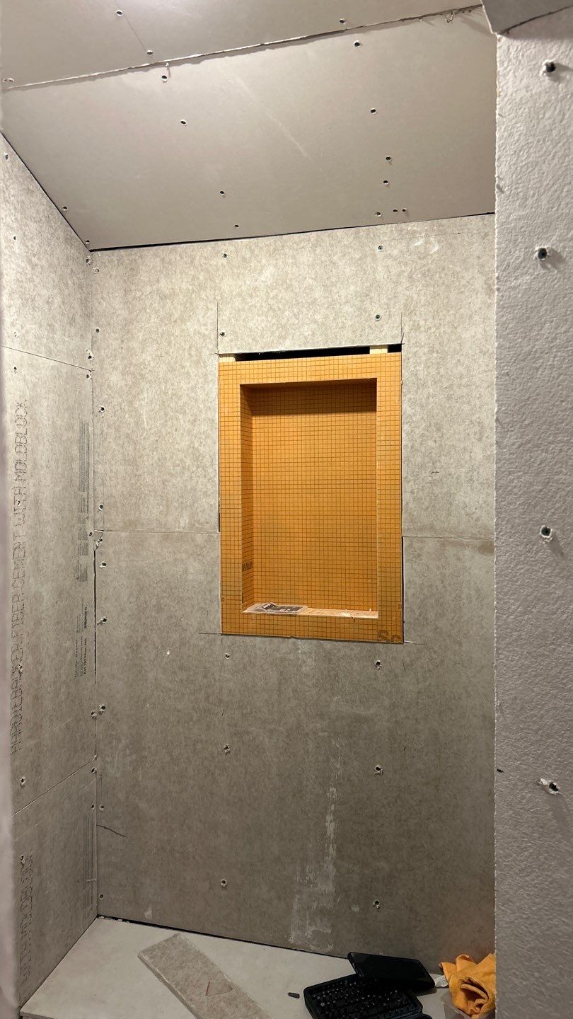 Tile shower and floor by Footprints Floors of Nashville