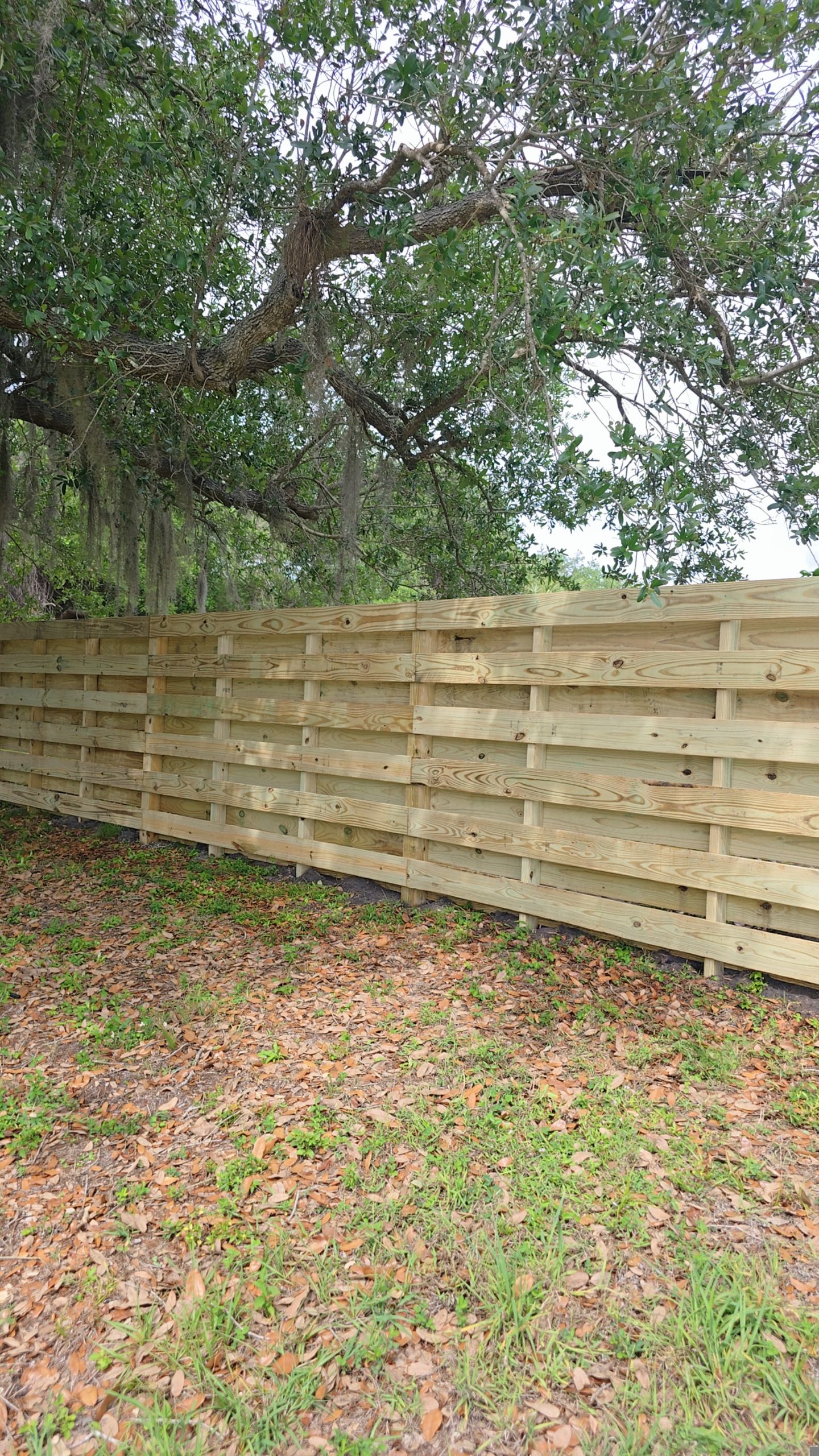 Horizontal Shadowbox Fence in Port Charlotte by True Fence LLC