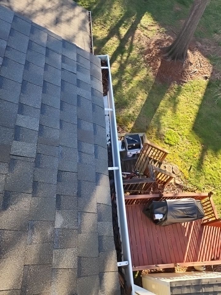 Gutter Cleaning using water by Power Wash Masters LLC
