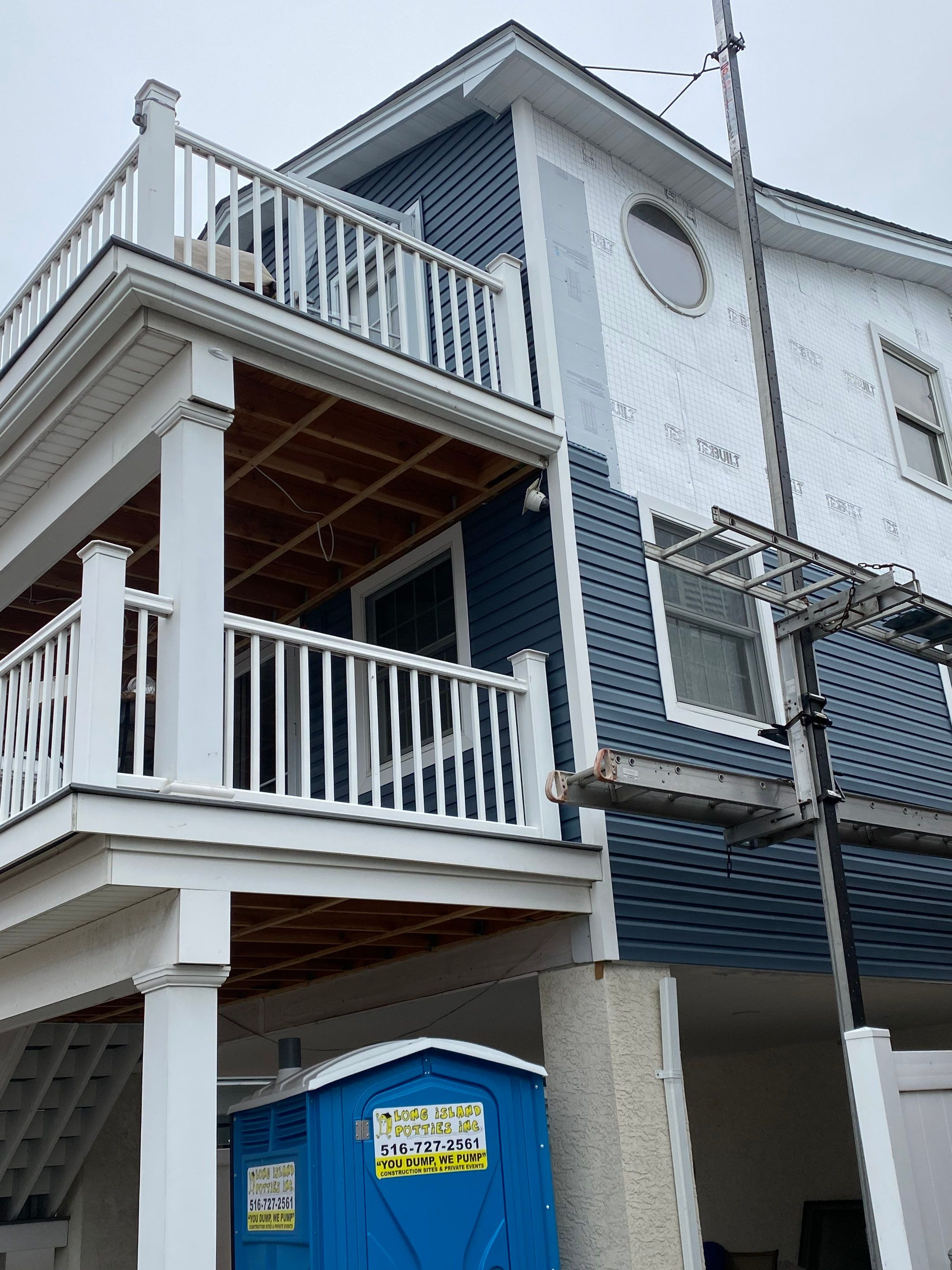 House lift in the westend of Long Beach.  by Above All Gutters 