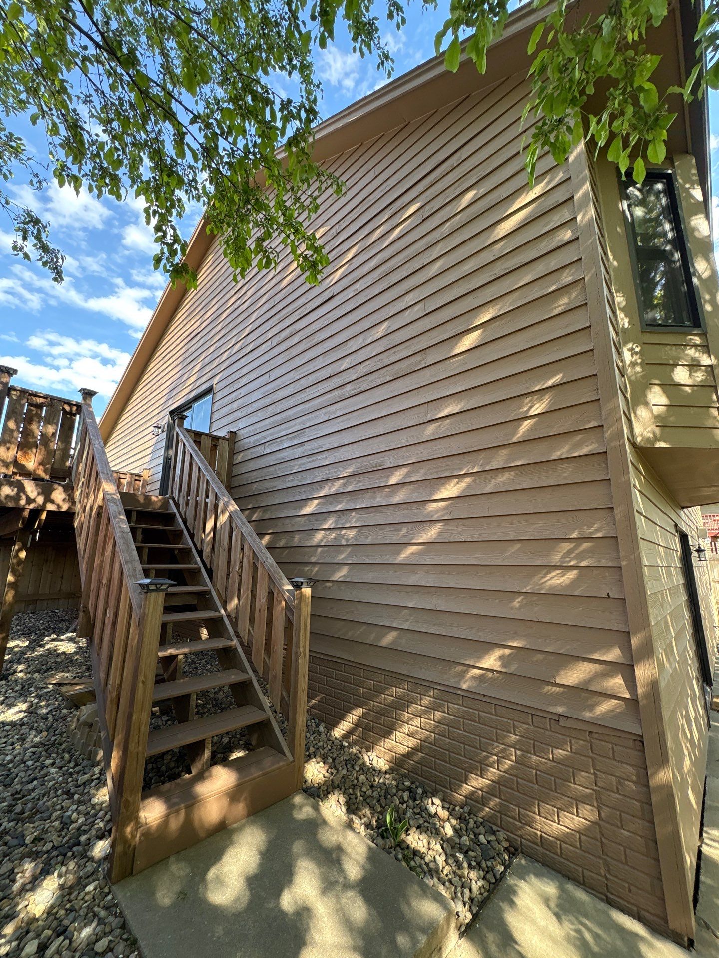 Wood Siding Restoration and Exterior Painting in Sioux Falls by Select Painting, Coatings & Garage Cabinets