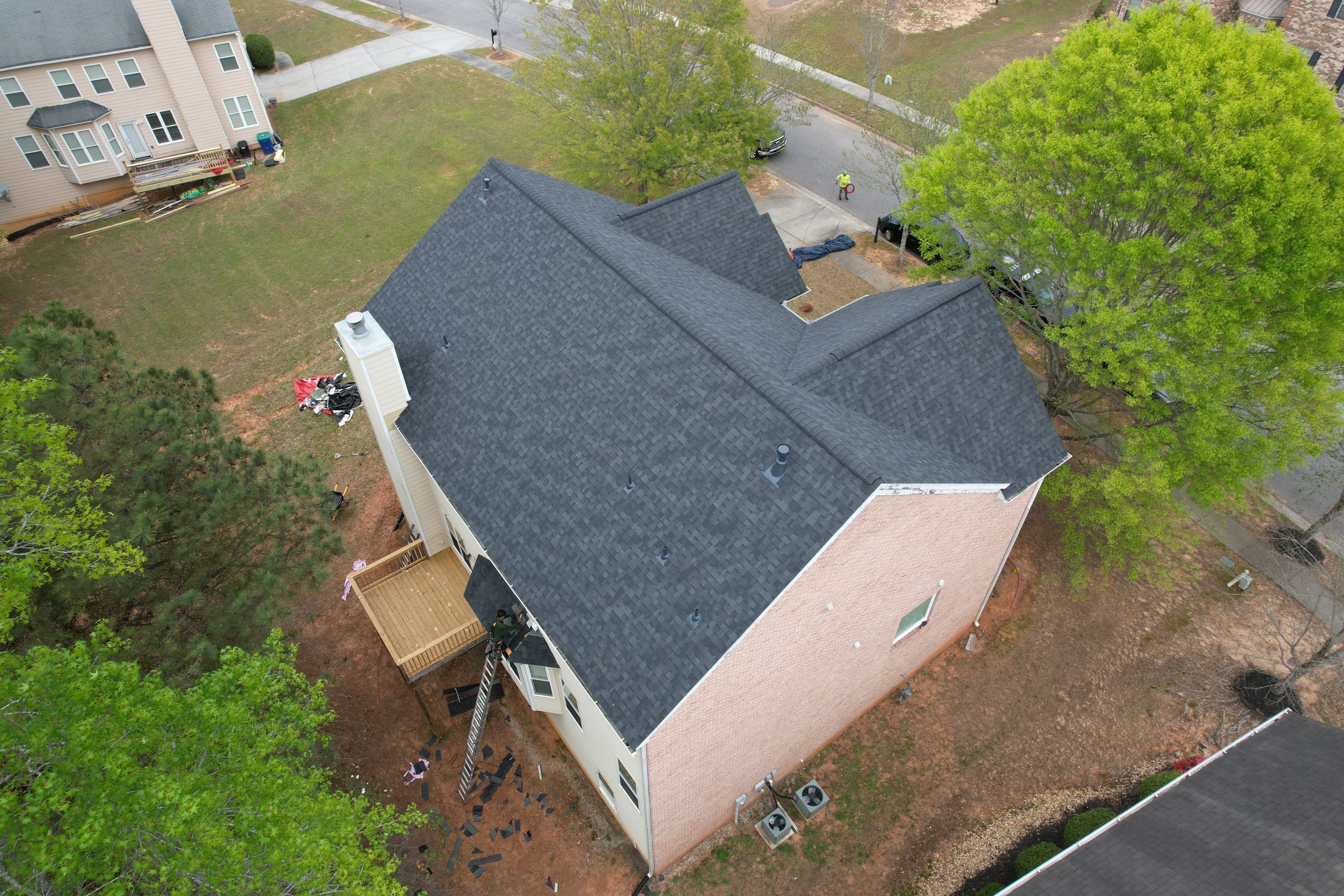 Residential Roofing Installation using Owens Corning Onyx Black by Inspector Roofing and Restoration