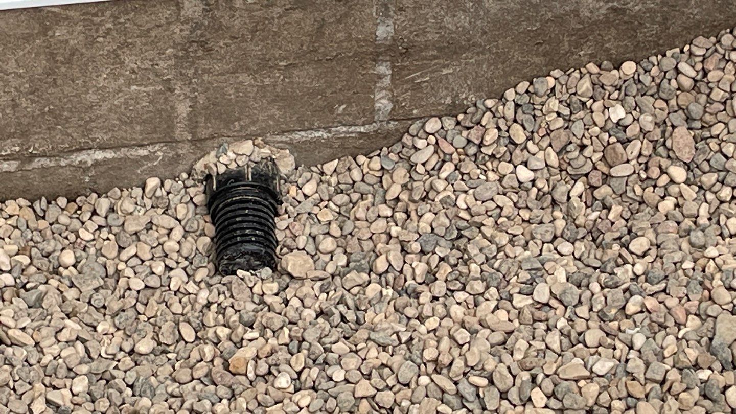 Interior Drain Tile & Buried Discharge in South Minneapolis by Waterproofing Northeast