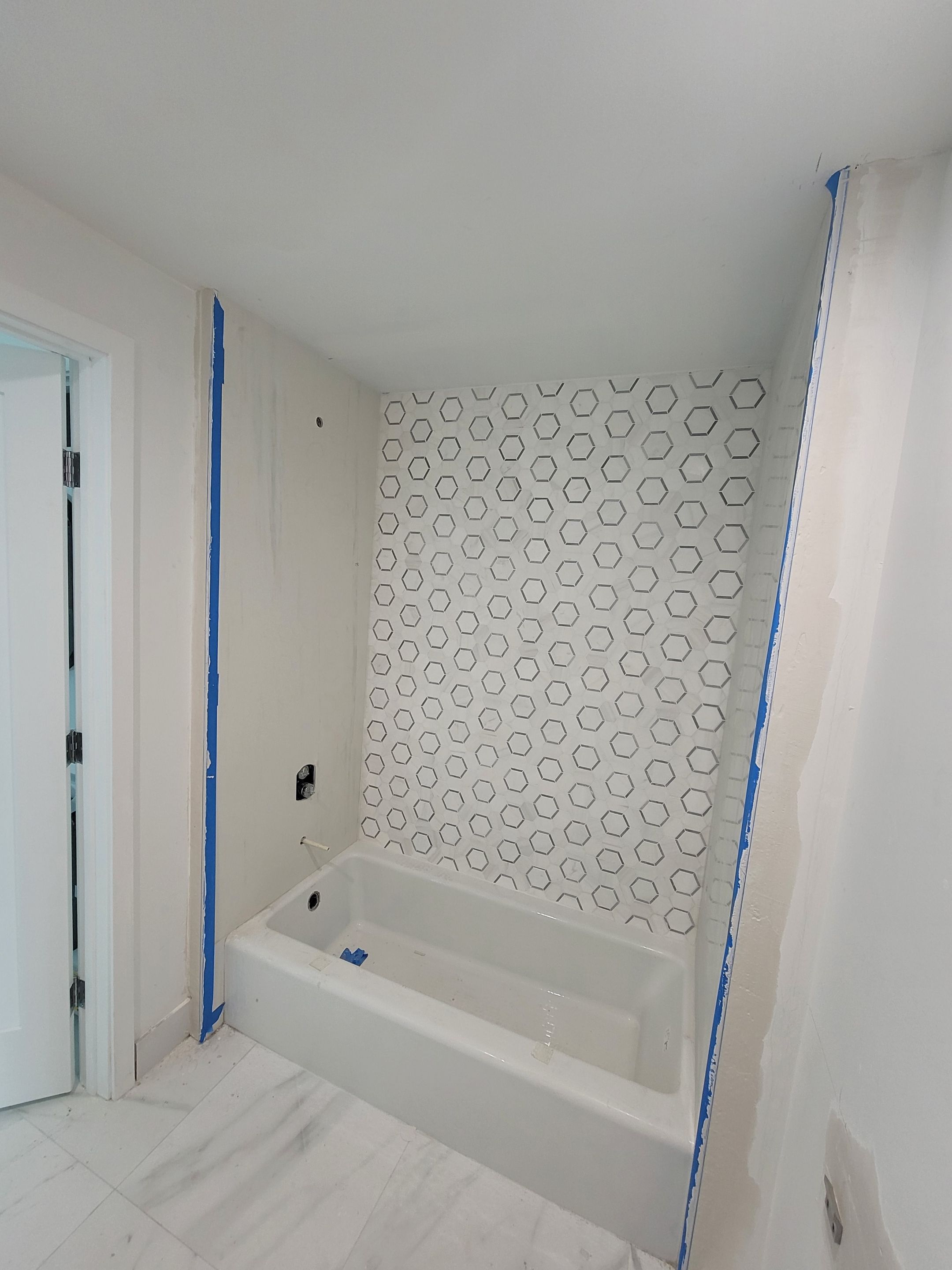 Modern High-Rise Interior Renovation and Custom Tile Installation in Miami by Picos Construction Engineering