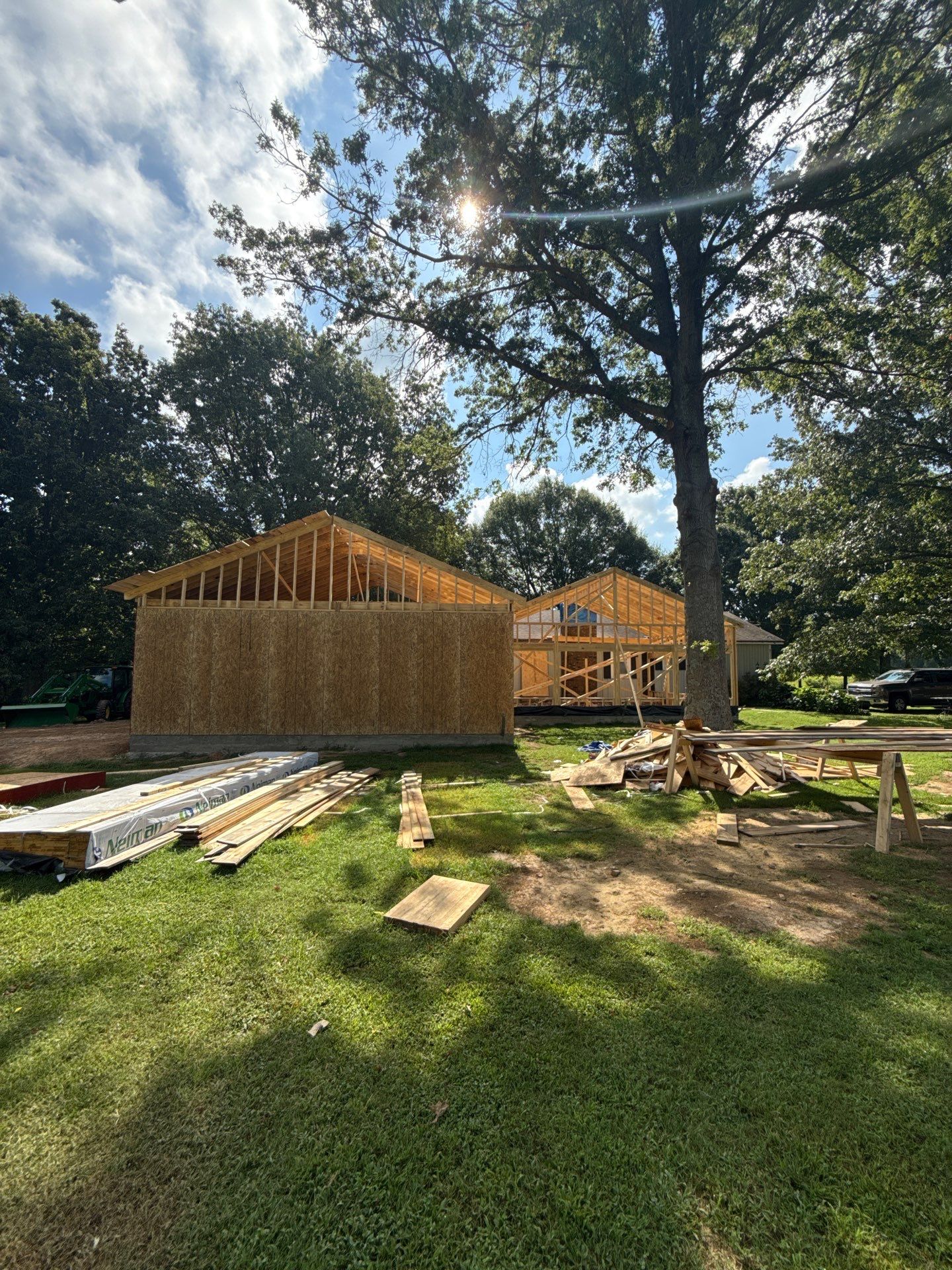 Sunroom and Garage Addition by Skilled Construction LLC