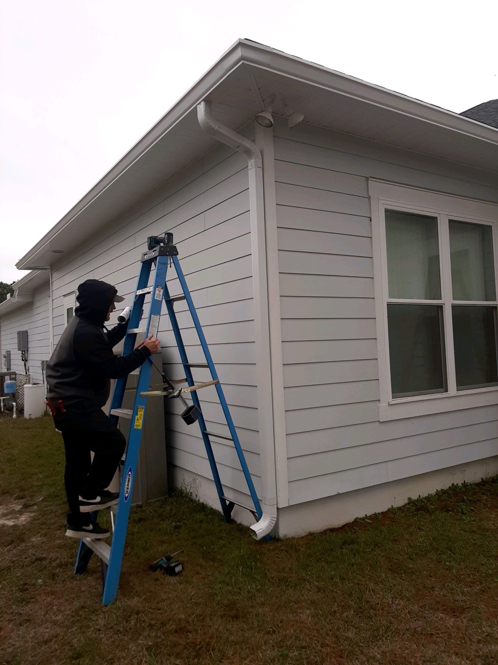Gutter Installation using White K-Style Seamless Gutters by Gutter Professors