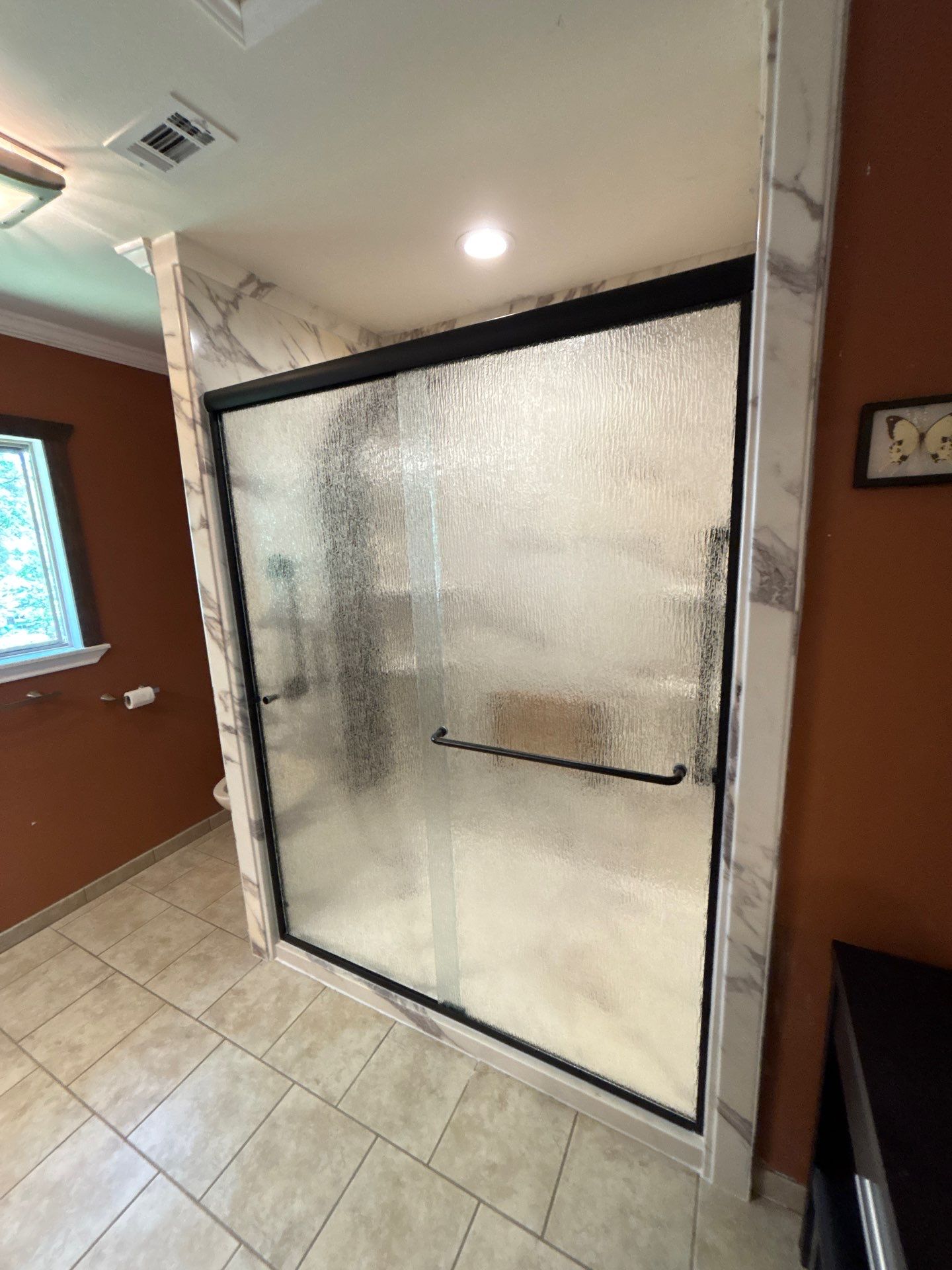 Tub to walk in shower and new free-standing tub in Canyon Lake by Lane Lauritsen - The Hill Country, Texas