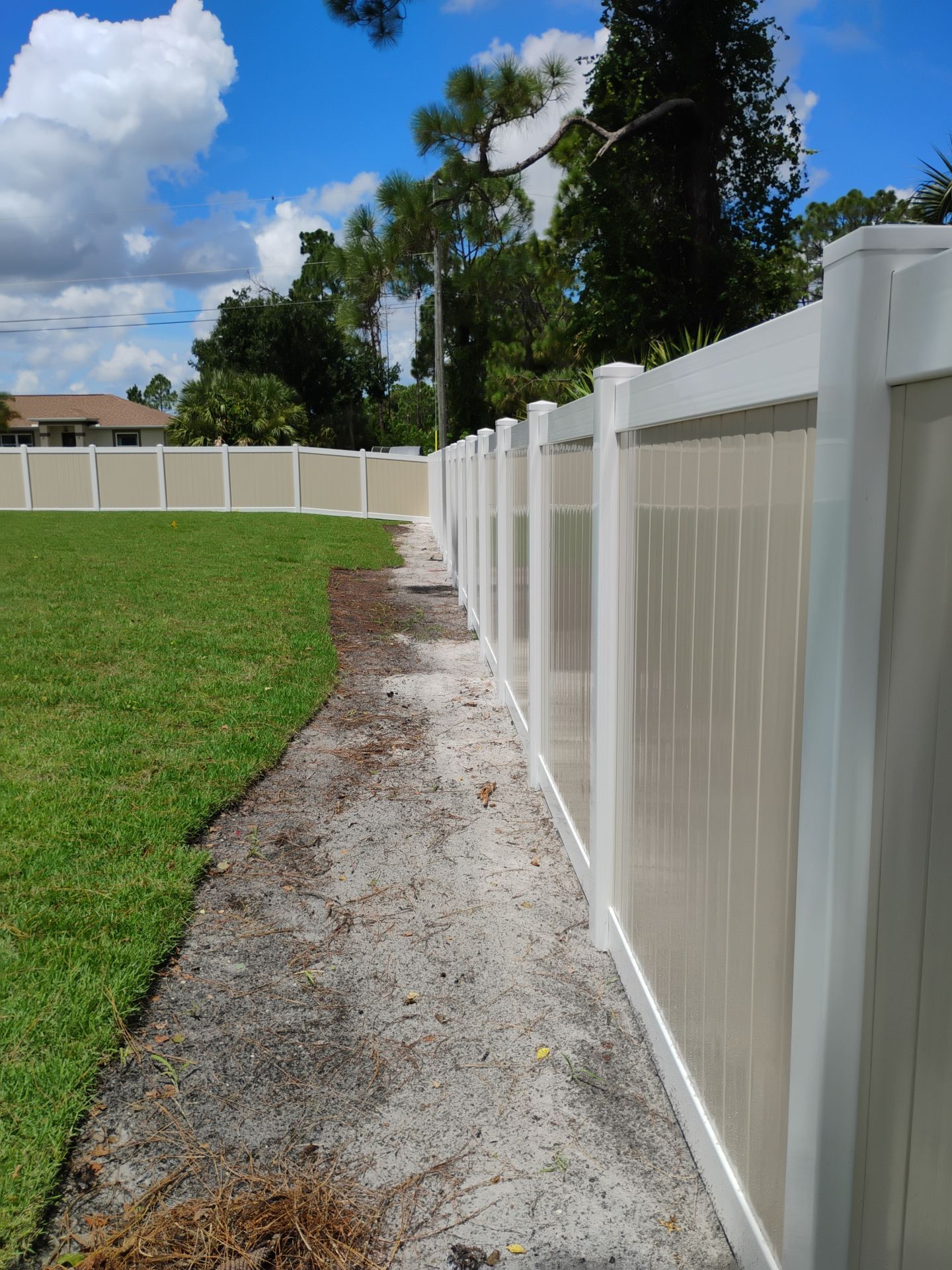 Custom Two-Tone Vinyl Privacy Fence Installation in North Port by True Fence LLC