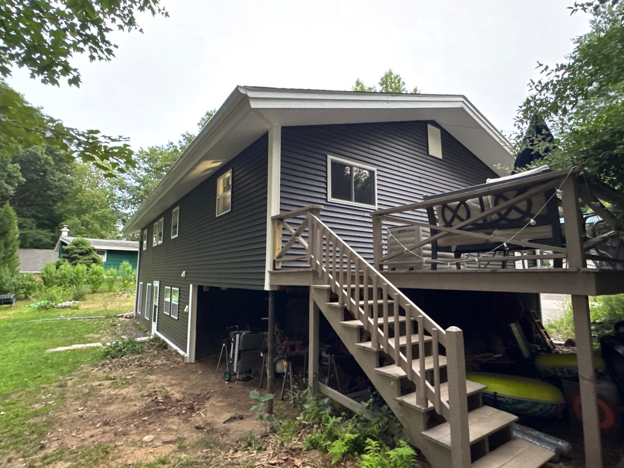 Full Vinyl Siding, Window & Door Replacement Near the Bellamy River in Dover, NH by Compass exteriors