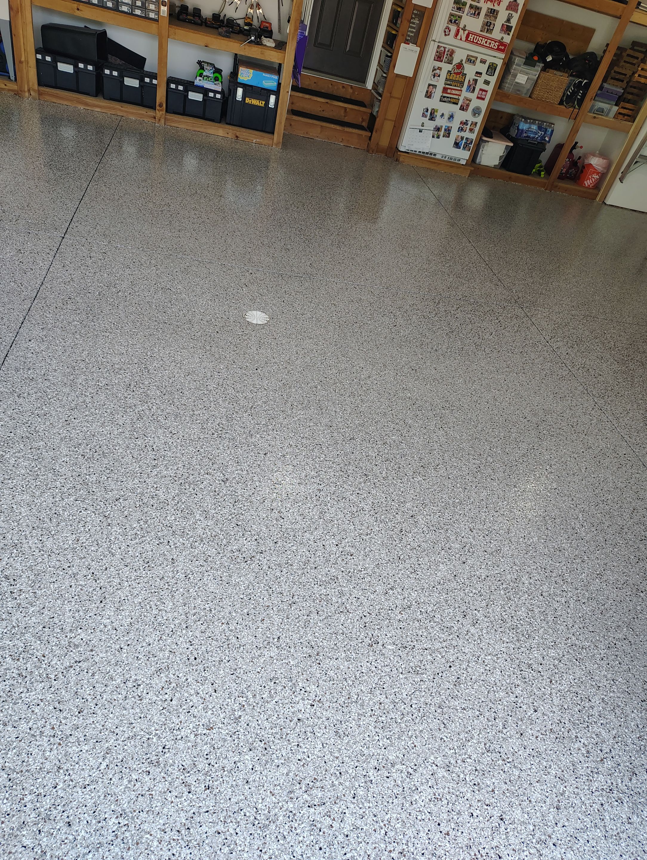 Coyote Garage Floor Coating in Sioux Falls by Select Painting, Coatings & Garage Cabinets