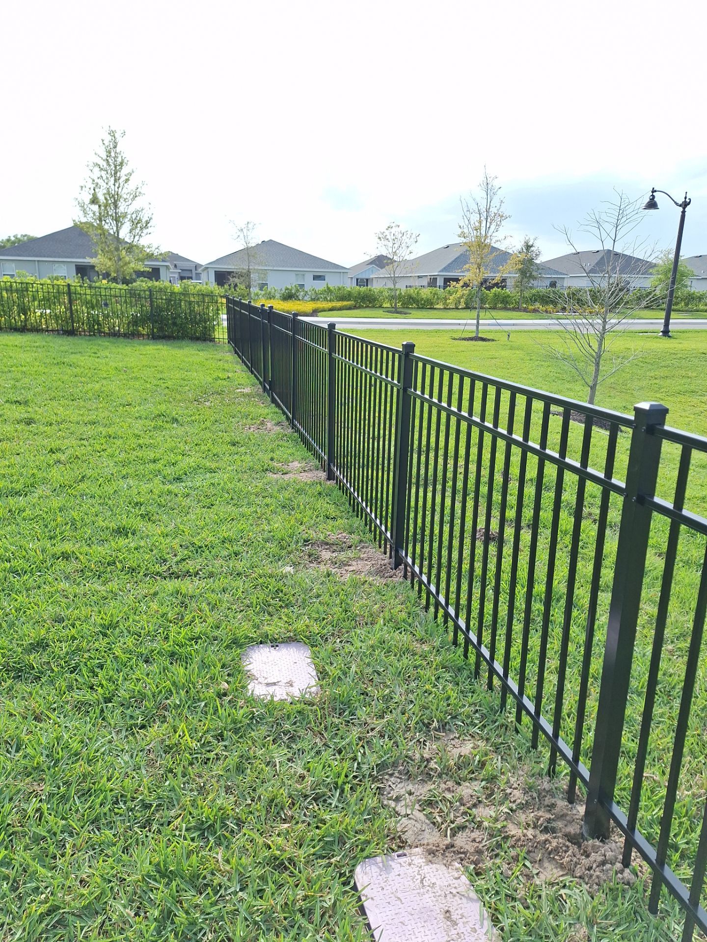 Aluminum Fence Installation using Black 3 Rail Aluminum Fence by Asap fence and gates, LLC