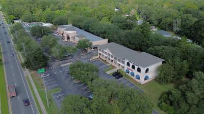 Reroofing a Commercial Building on Archer Road Gainesville, FL