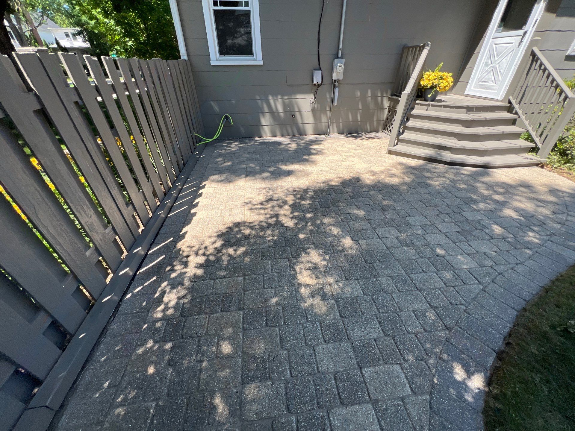 Brick paver cleaning and sealing by Northern Power Washing LLC.