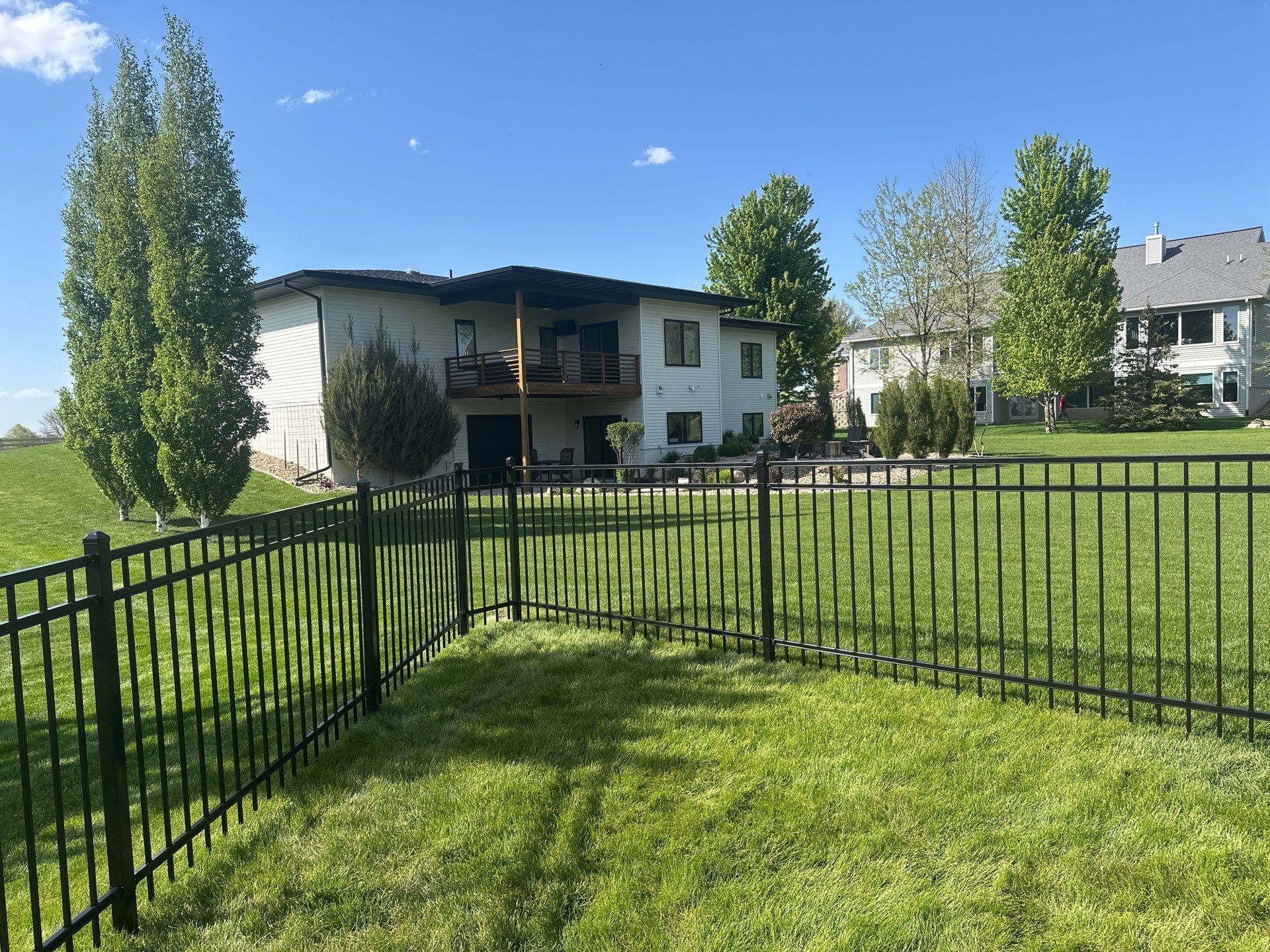 Black Ornamental Metal Picket Fence Installation in Waterloo by Perfect Picket Fence and Stain