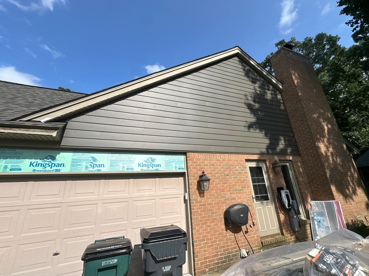 Roof Replacement using Owens Corning Peppercorn and Siding Replacement using Ascend Charcoal Smoke by 180 Contractors