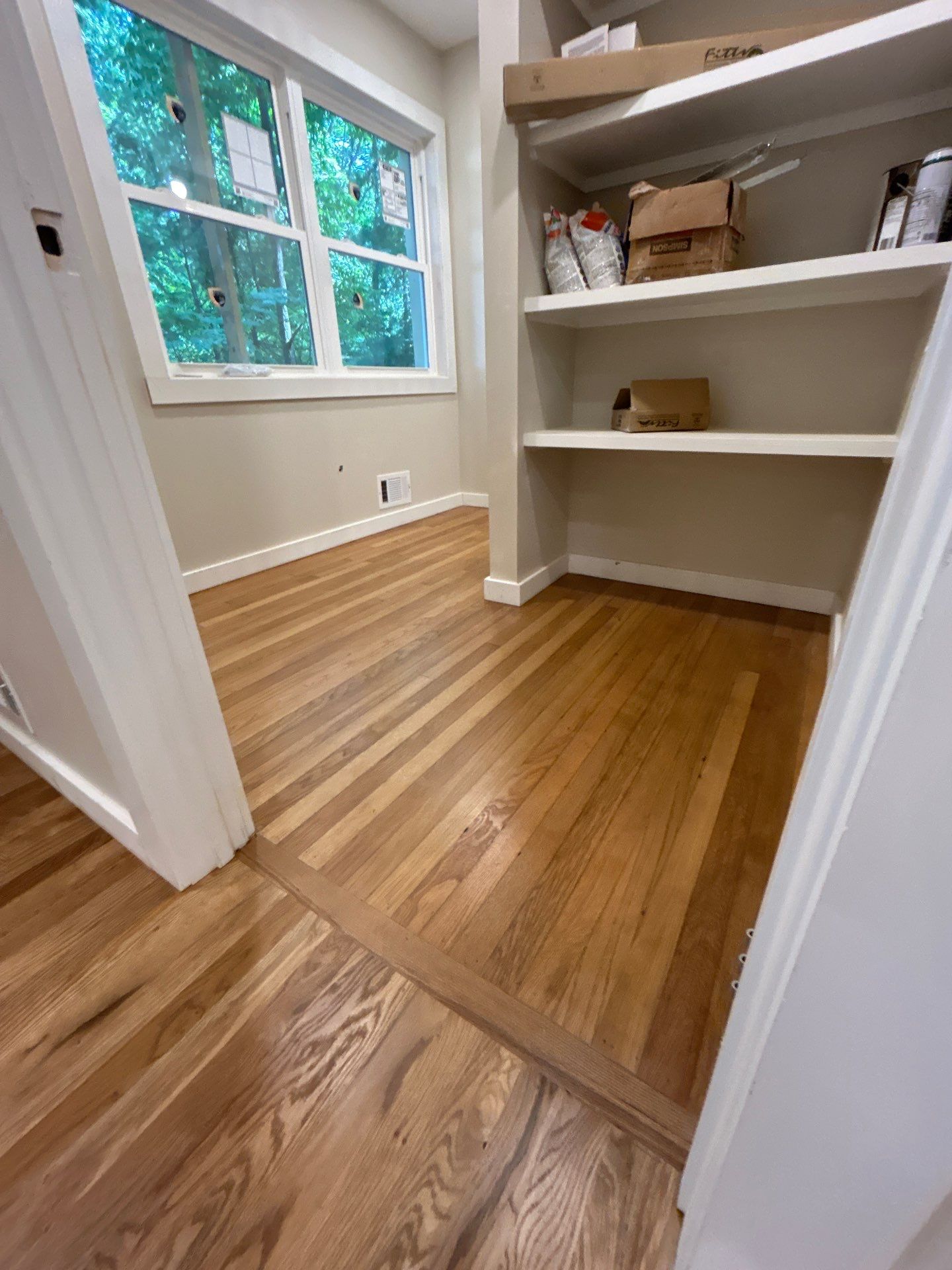 Remodel with existing and new white oak by Footprints Floors of East Atlanta