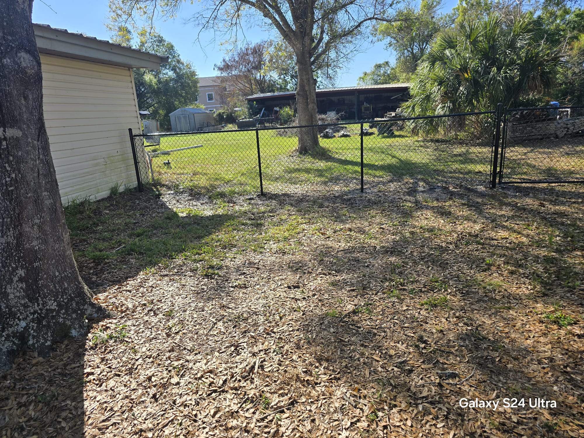 Black Chain Link Fence Installation in Port Charlotte by True Fence LLC