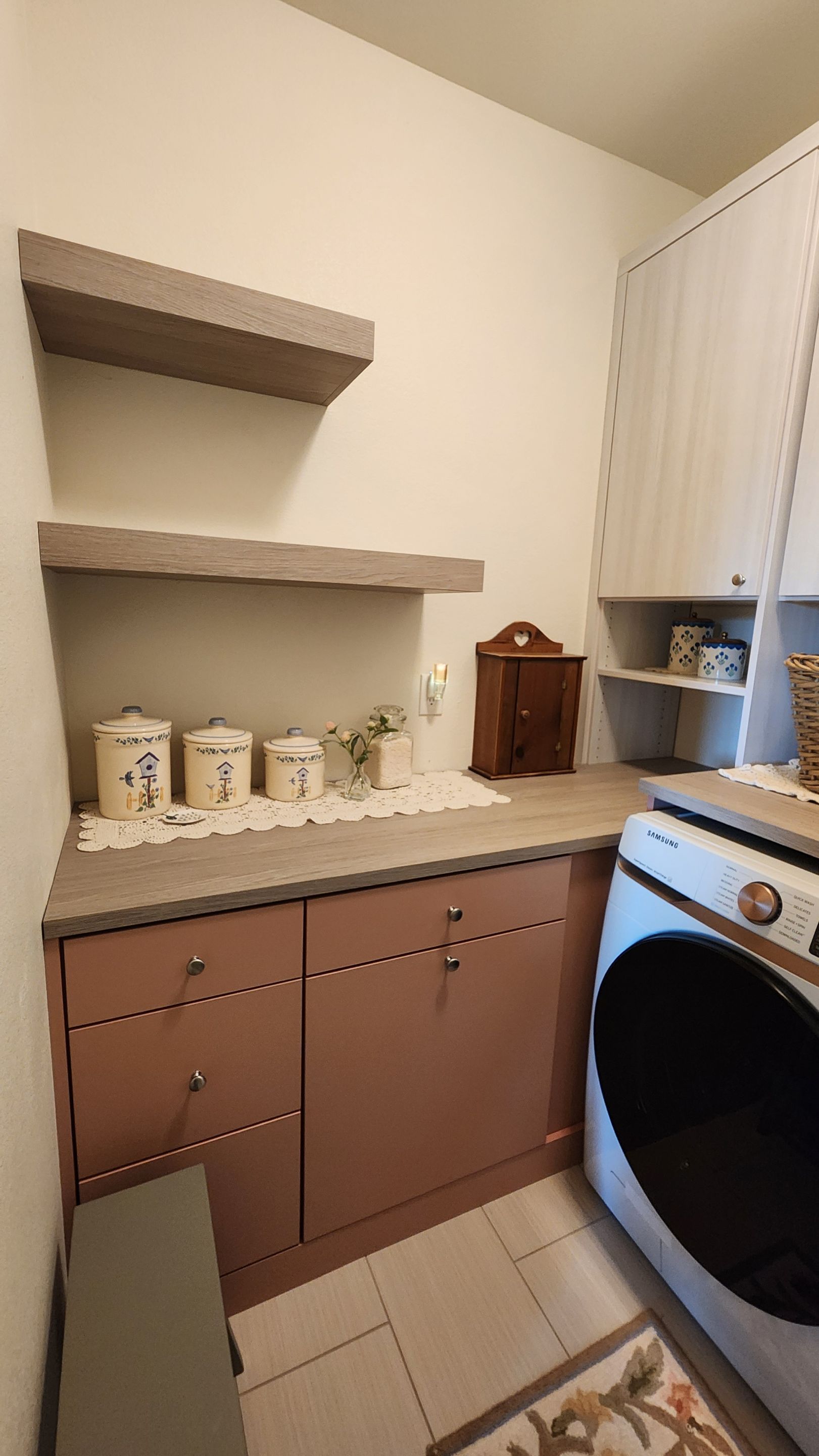 Laundry Room designed to match closets by Concept 32, Inc.