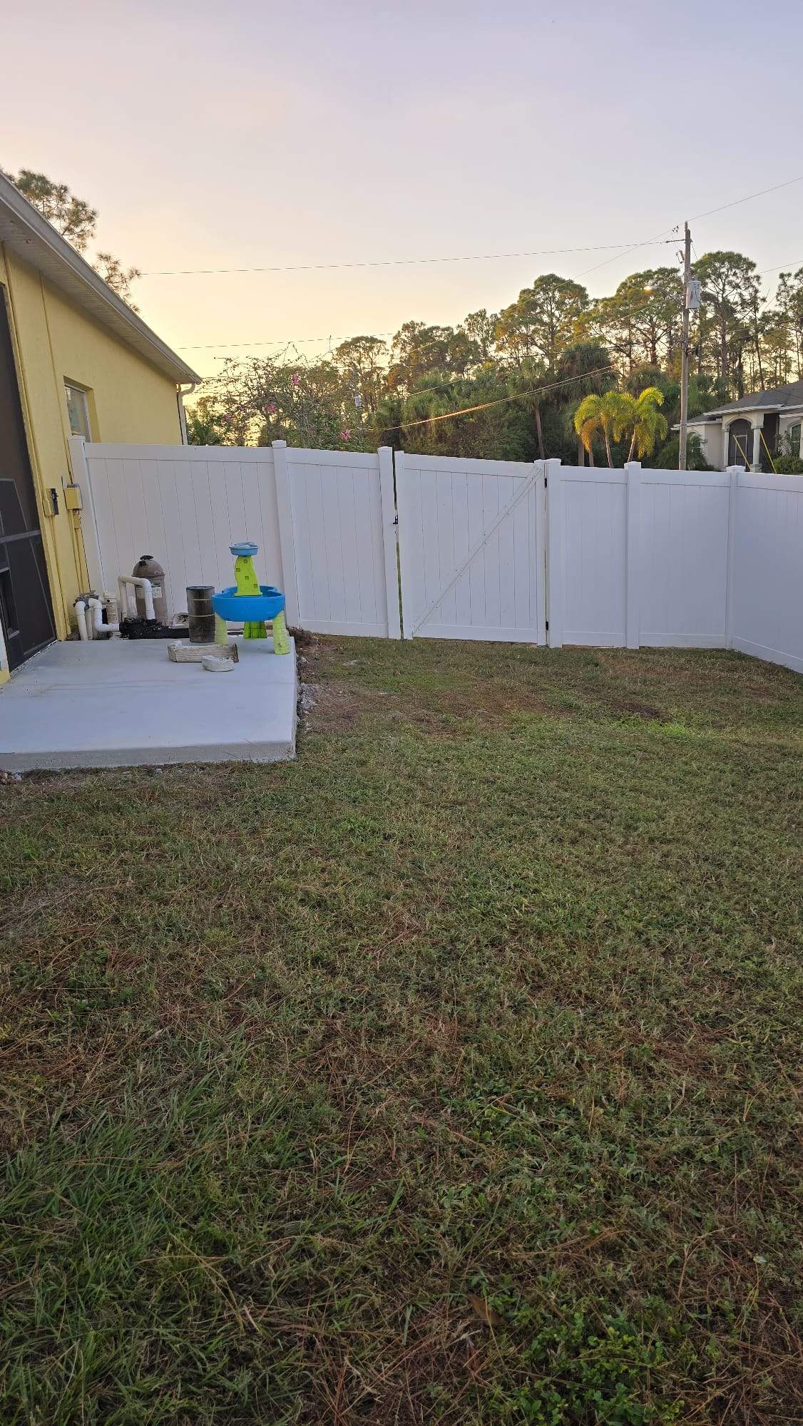 White Vinyl Privacy Fence Repair and Gate Installation in North Port by True Fence LLC