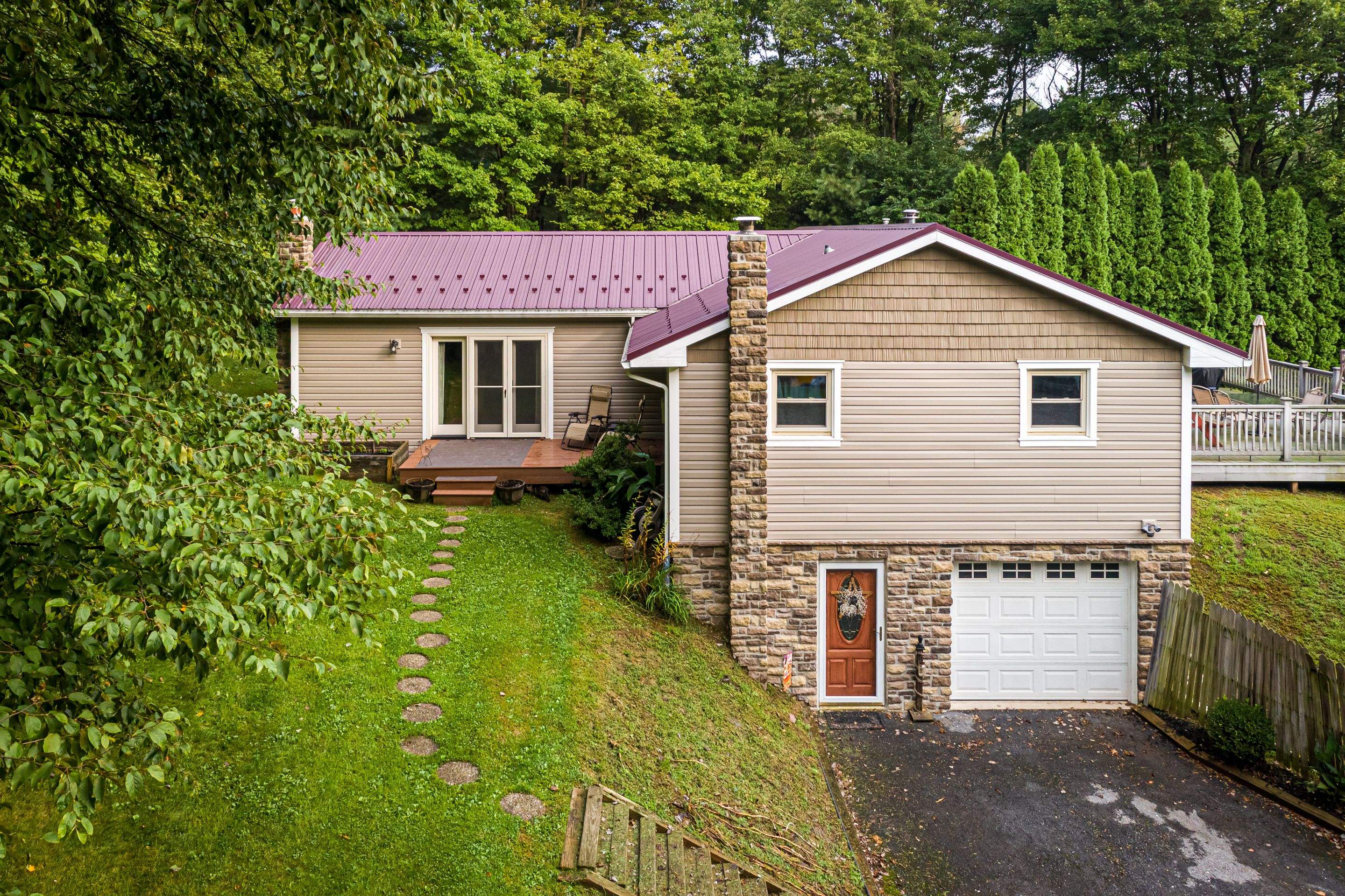 Vinyl Siding- by Esh Builders