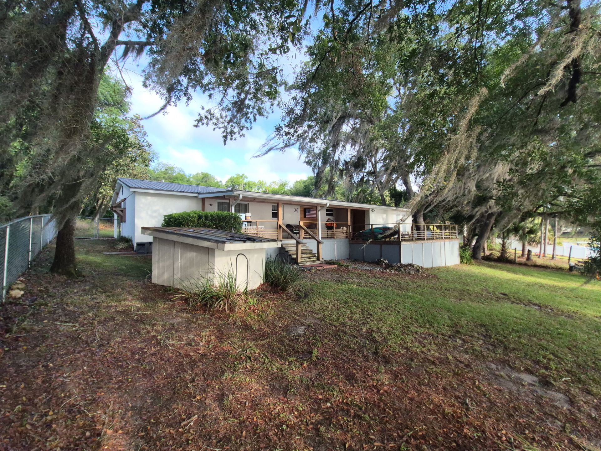 Professional Metal Roof and Stucco Cleaning in Silver Springs by Infinite Exteriors LLC