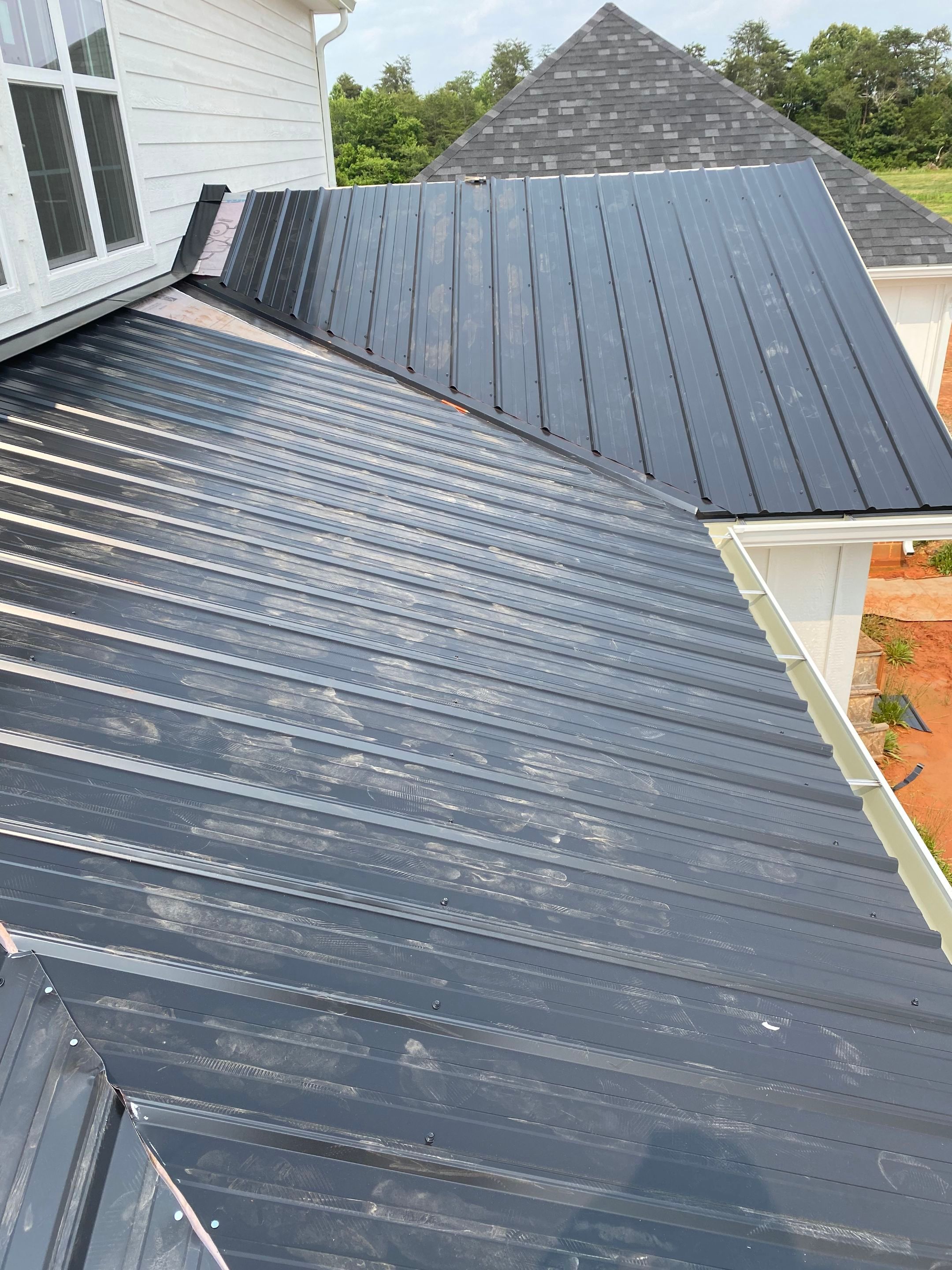 Jason's metal porch roof by BROCK BUILDERS 