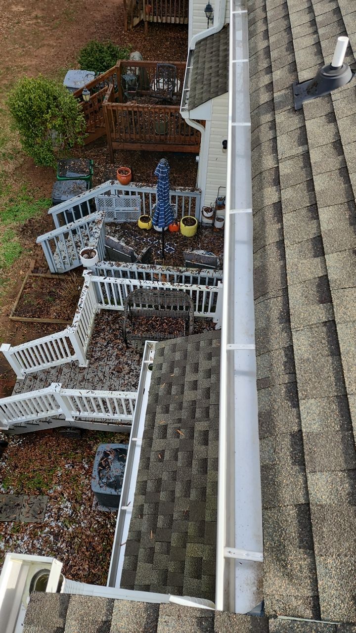 Gutter Cleaning using water by G&H Home Tech Pros LLC