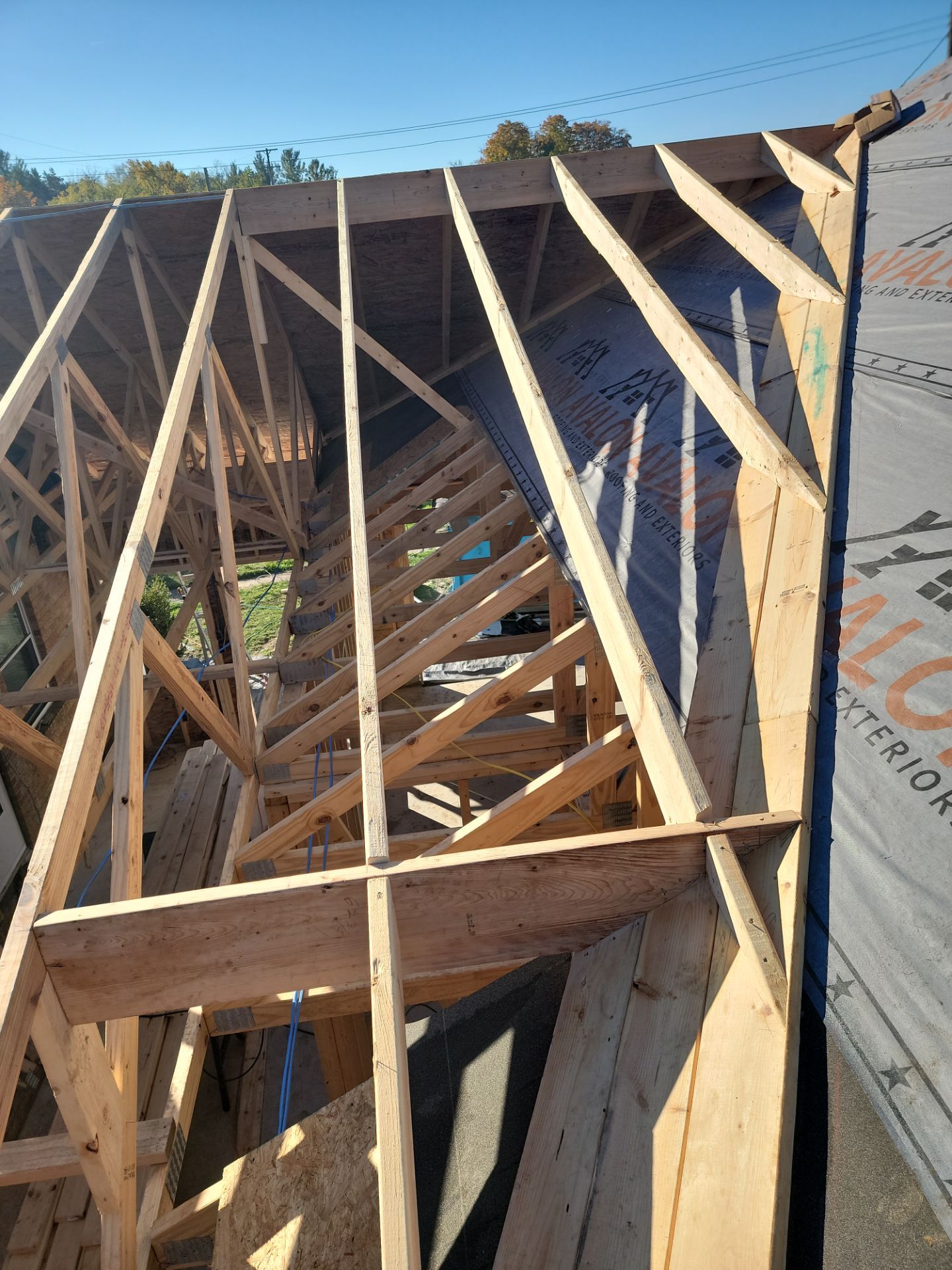 Garage & Addition (In Progress) by Avalon Roofing and Exteriors