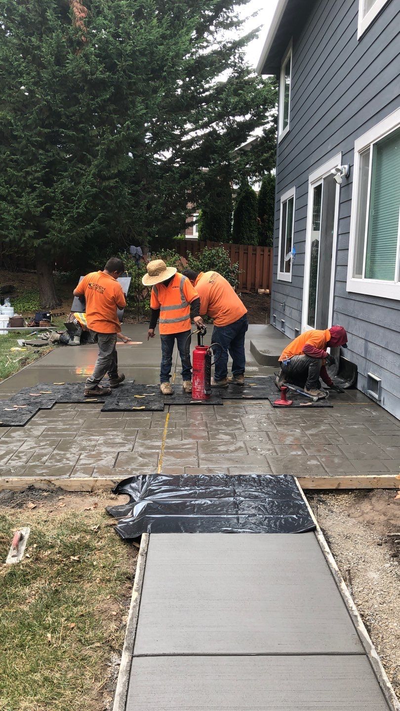  Amy | Stamped Finish Patio, Concrete Project by Jireh Asphalt & Concrete Inc 